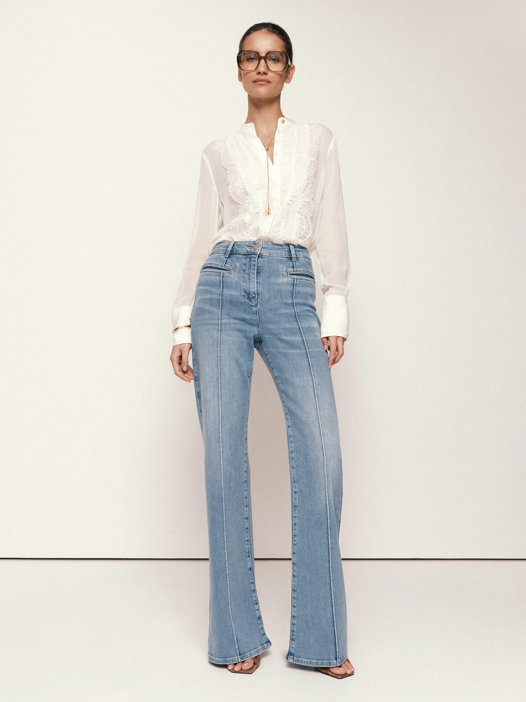 Petite Slim-Leg Mid-Rise Jeans in Mid Blue Product Image