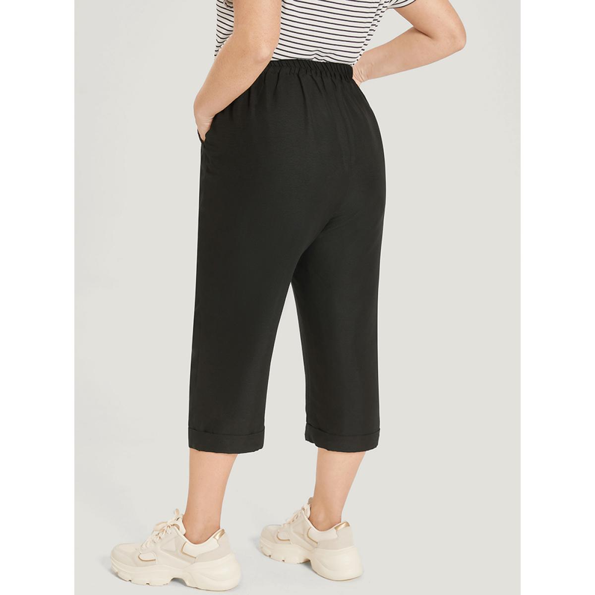 Plus Size Solid Pocket Button Detail Elastic Waist Pants Women Black Casual High Rise Dailywear Pants BloomChic 10/M Product Image