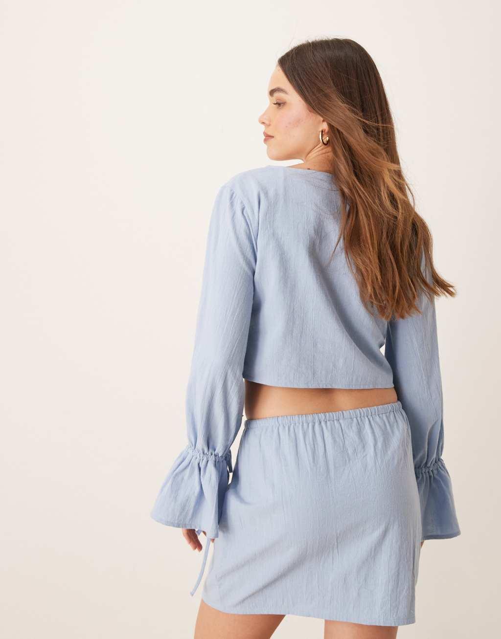 ASOS DESIGN Fern wrap front beach top in ice blue Product Image