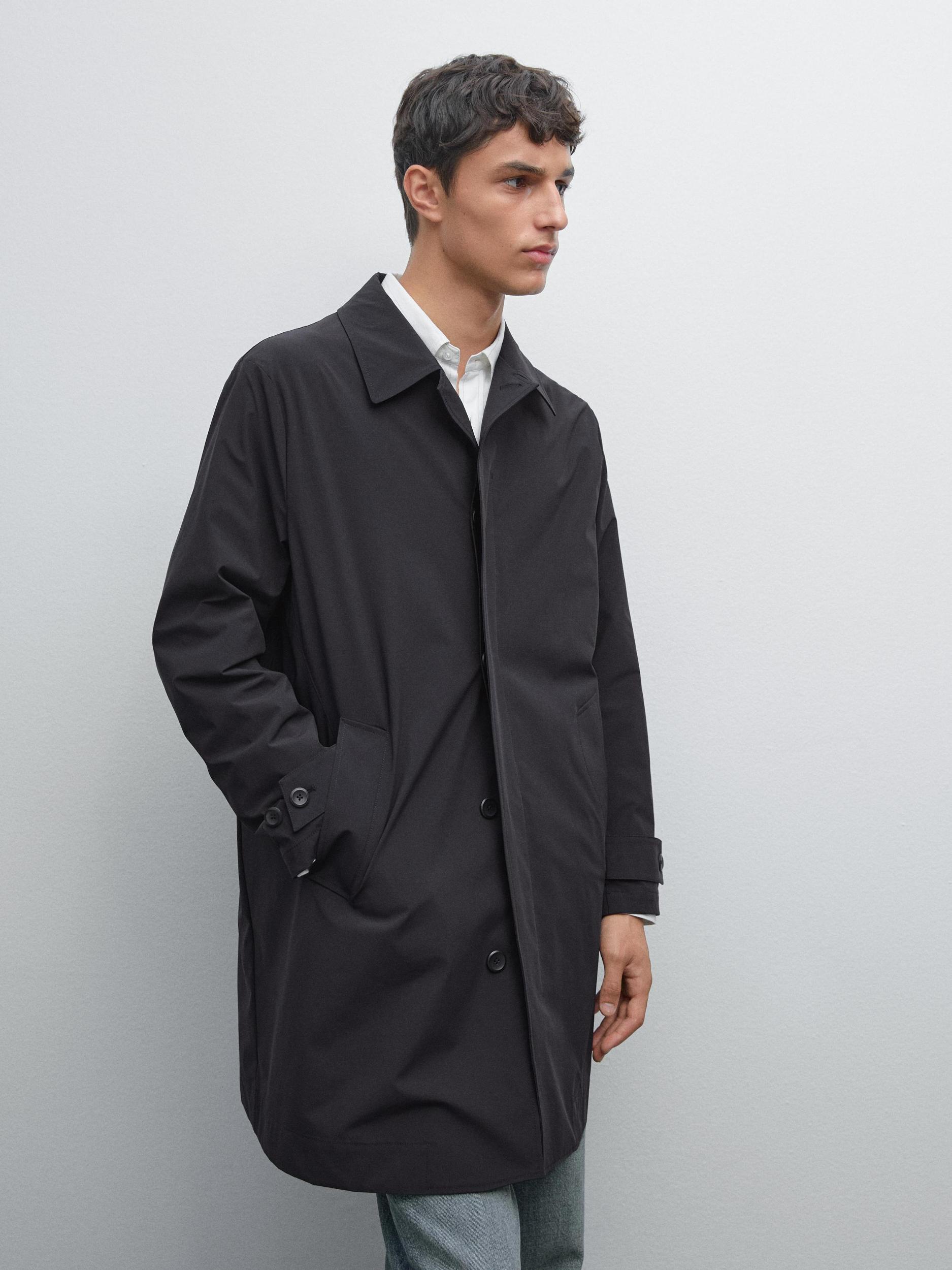 Lightweight trench coat with hidden buttons Product Image