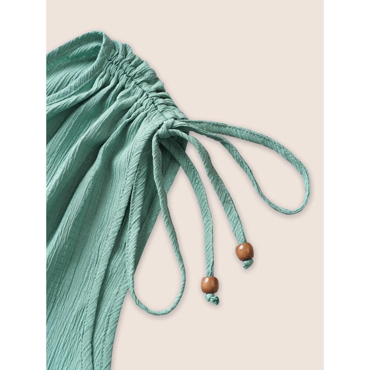 Plus Size Teal Plain Textured Surplice Neck Drawstring Jumpsuit Women Resort Sleeveless V-neck Vacation Loose Jumpsuits BloomChic 30/6X Product Image