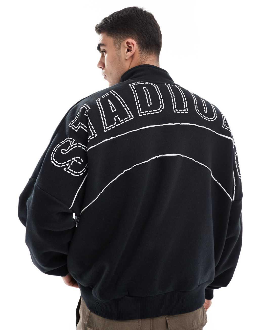 Bershka 1/4 zip piped back printed sweatshirt in black Product Image