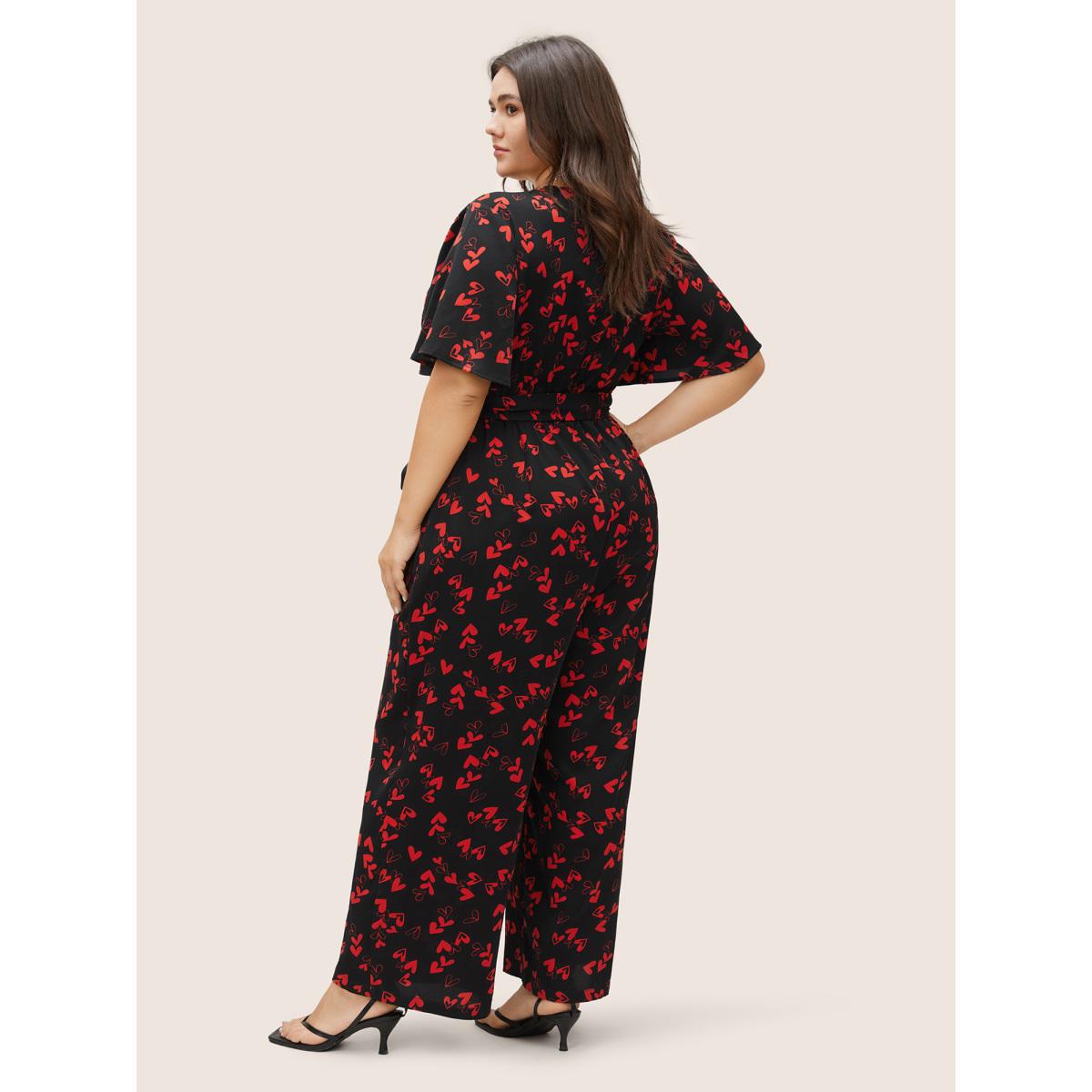Plus Size Black Heart Print Pocket Belted Jumpsuit Women Elegant Short sleeve V-neck Everyday Loose Jumpsuits BloomChic 22-24/3X Product Image