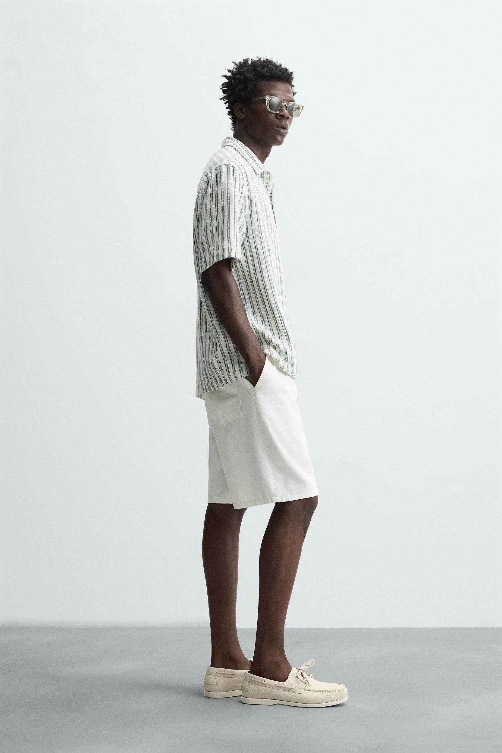 HERRINGBONE TEXTURED POLO SHIRT Product Image