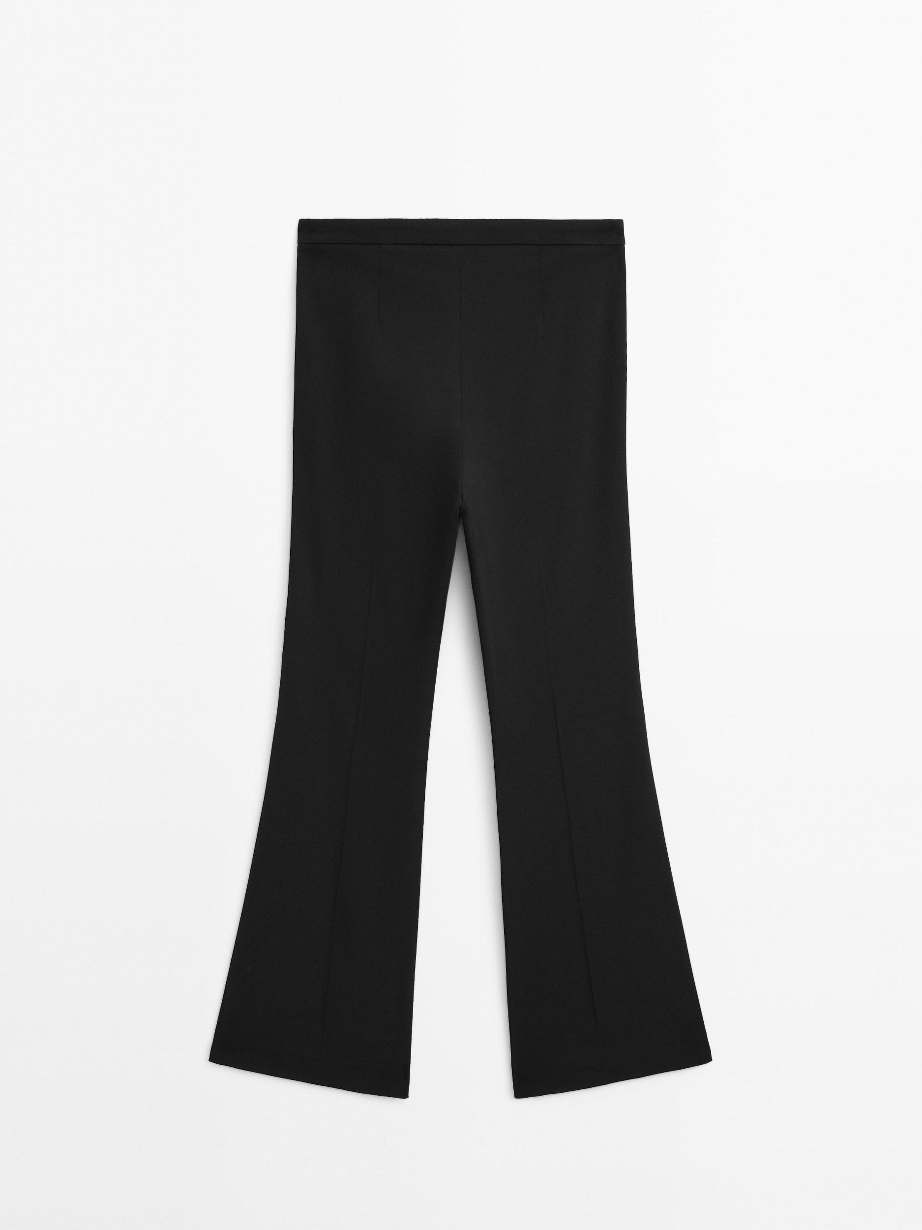 Flared trousers with pocket Product Image