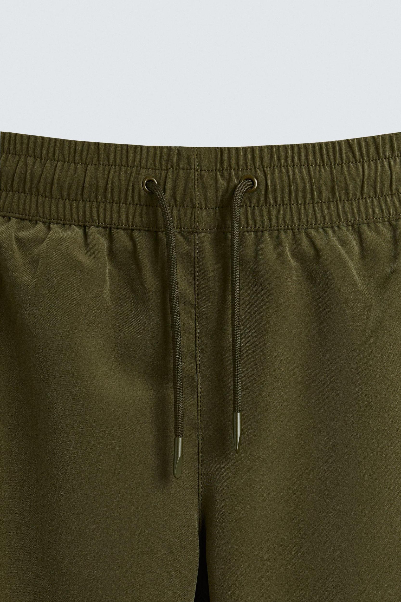 BASIC LONG SWIM TRUNKS Product Image