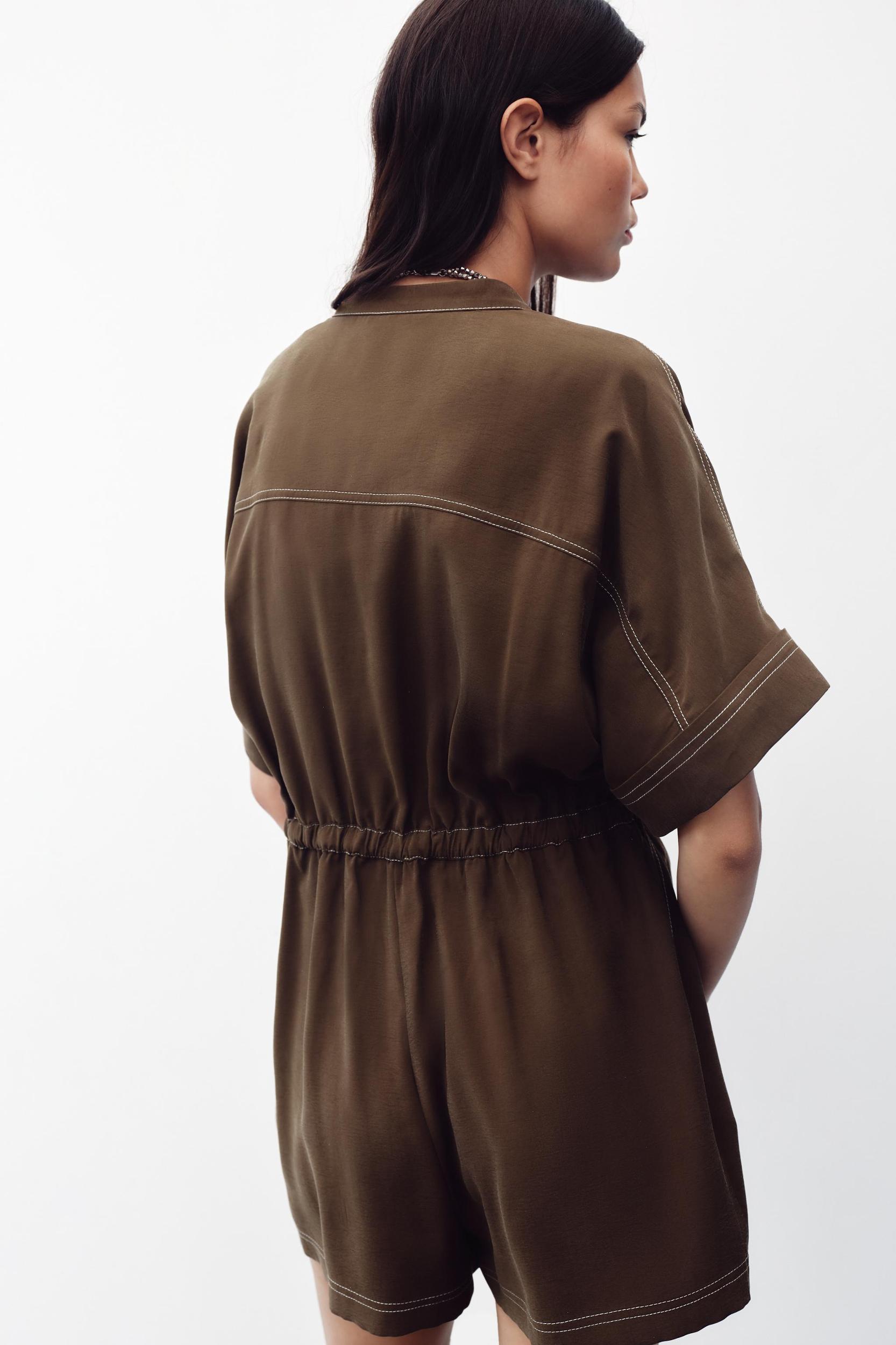 SHORT JUMPSUIT WITH TOPSTITCHING Product Image