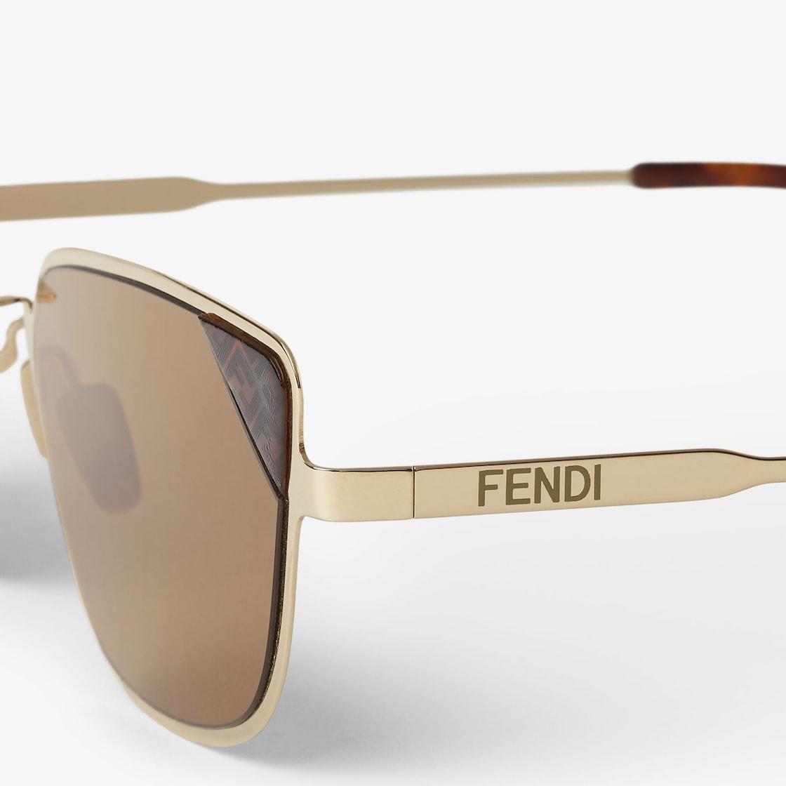 Fendi SignatureGold metal sunglasses with tobacco-color lenses Product Image