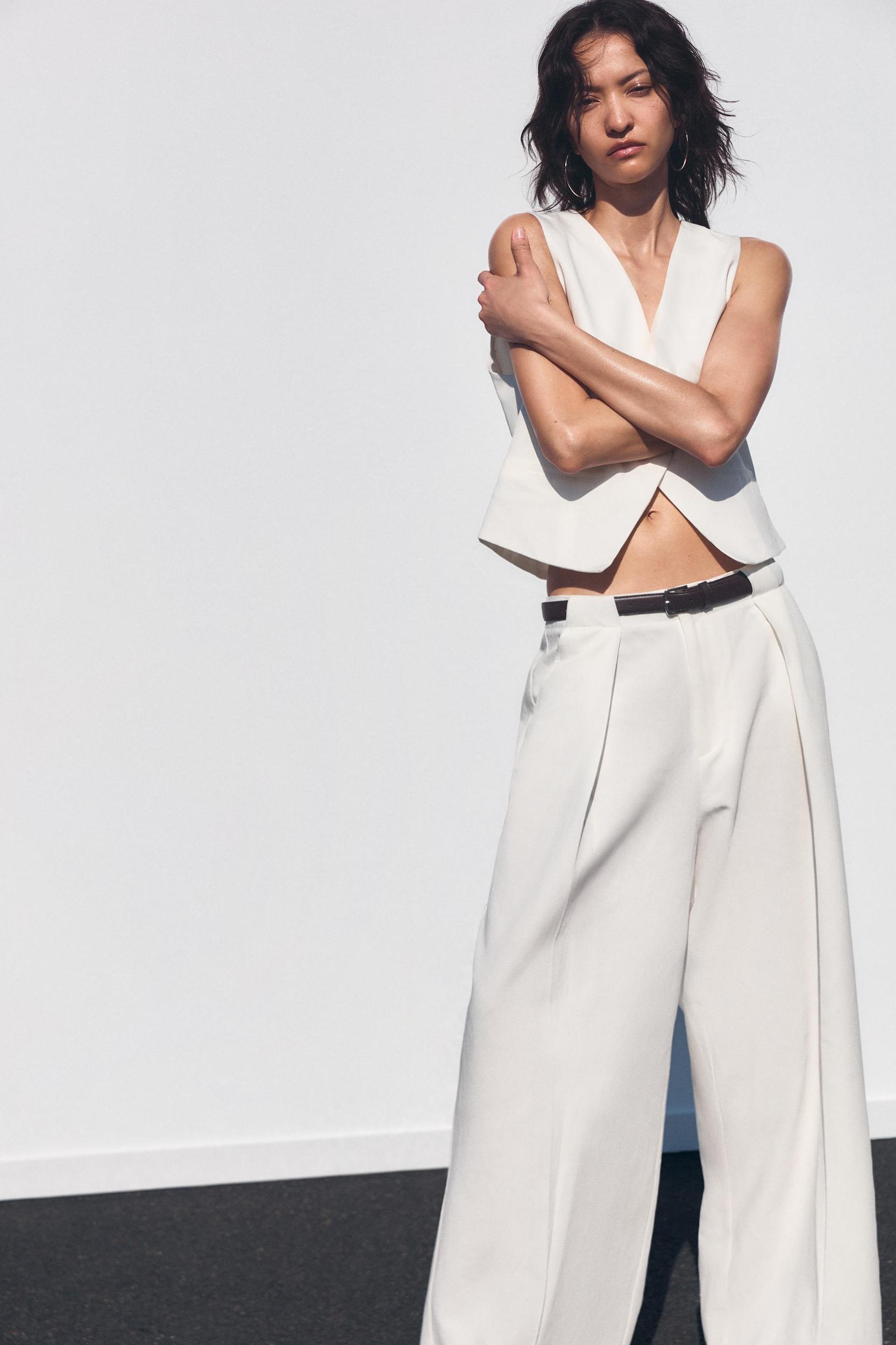 BELTED PLEATED PANTS Product Image