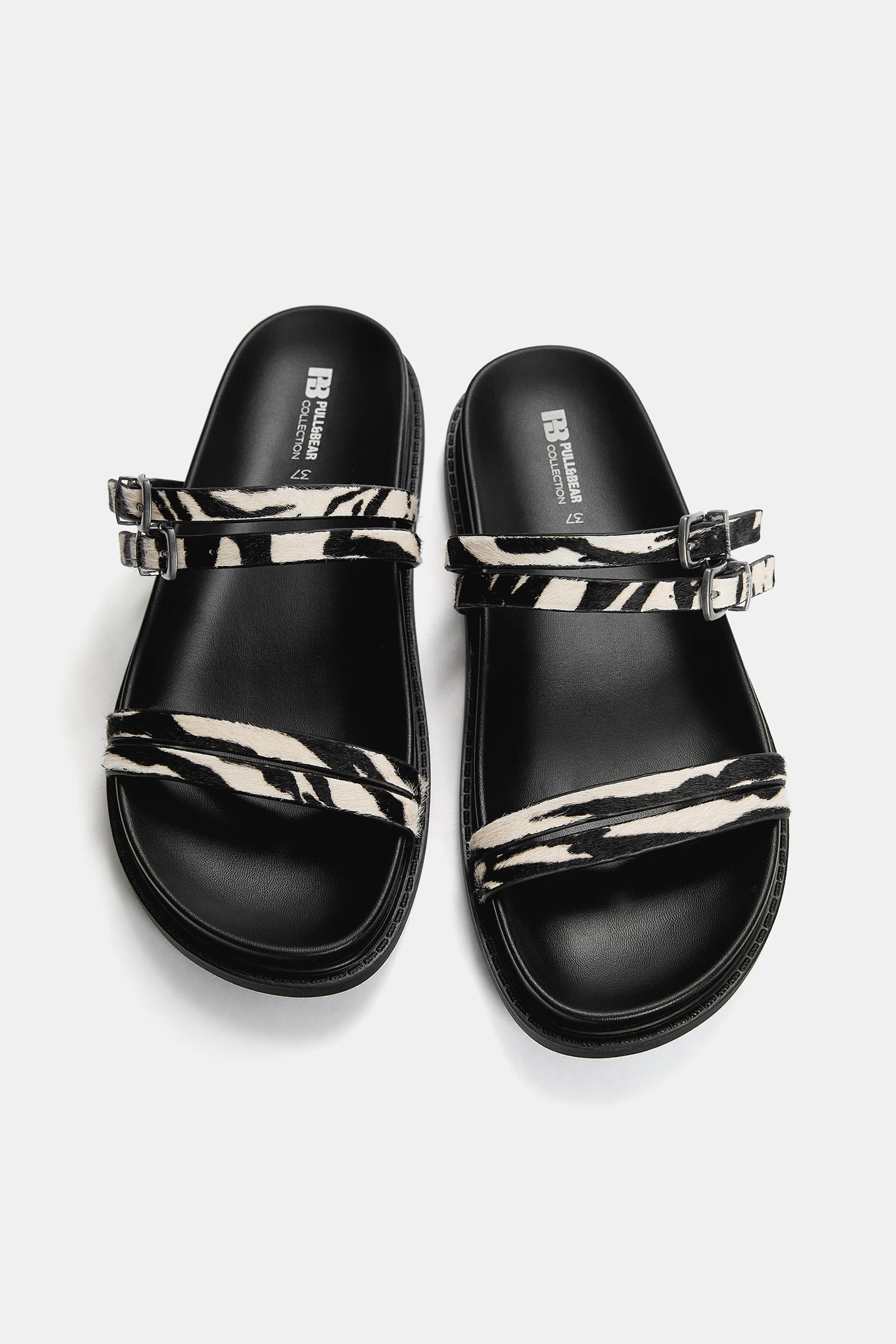 Flat leather animal print sandals Product Image