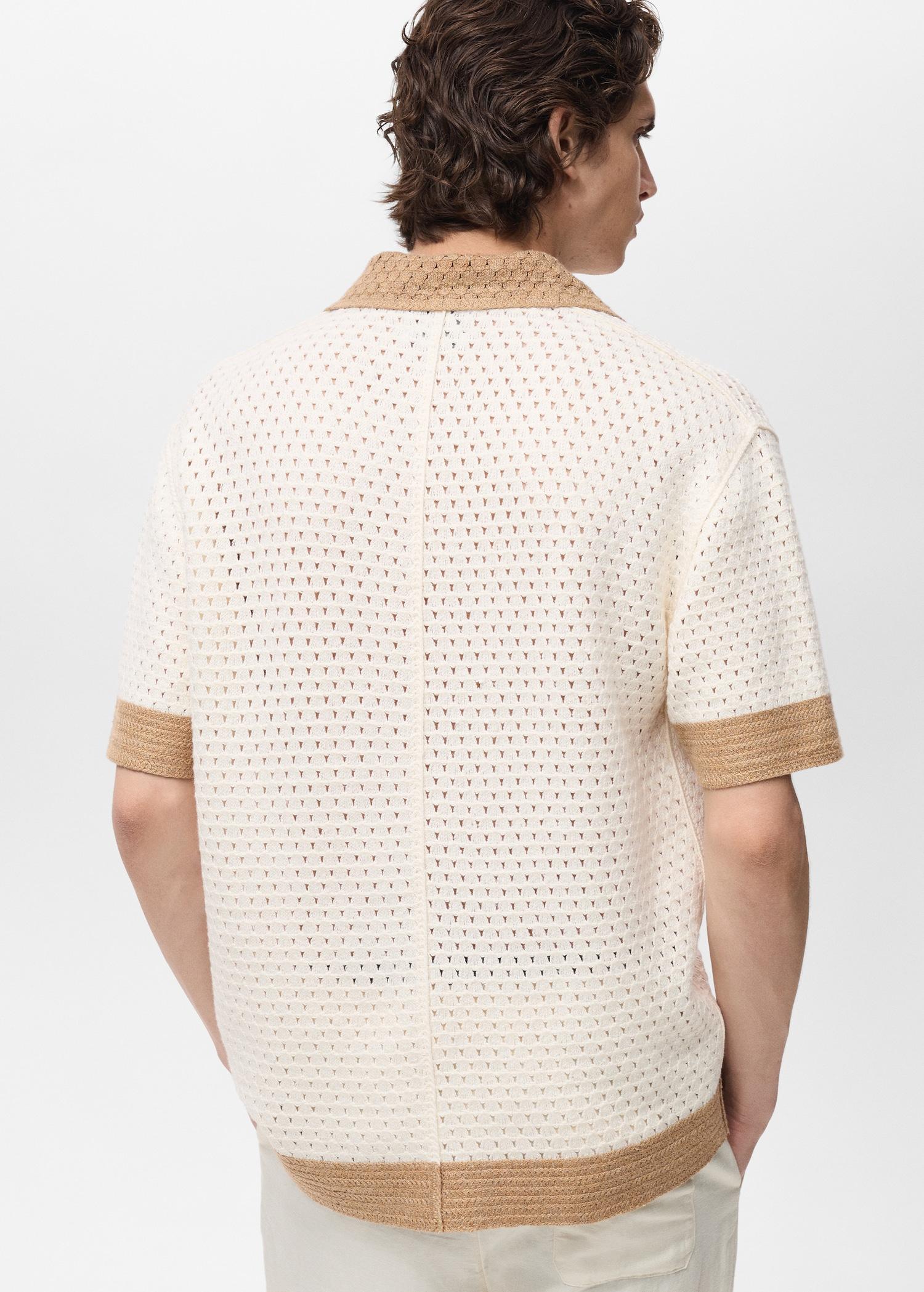 Openwork knitted polo shirt with contrasting details - Men | MANGO USA Product Image