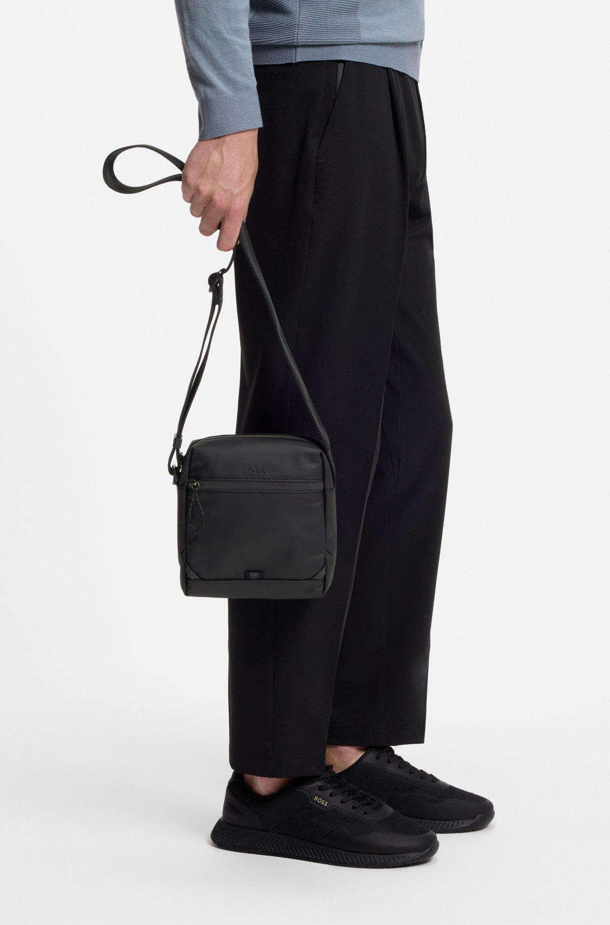 Reflective-detail reporter bag in faux leather Product Image
