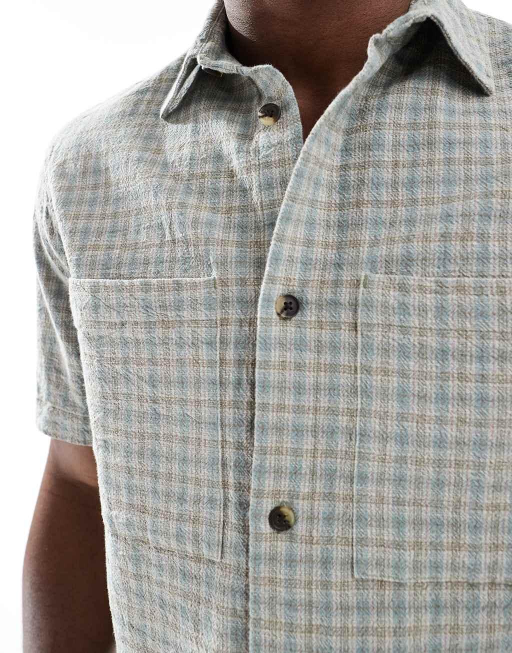 River Island short sleeve over shirt in muted plaid Product Image