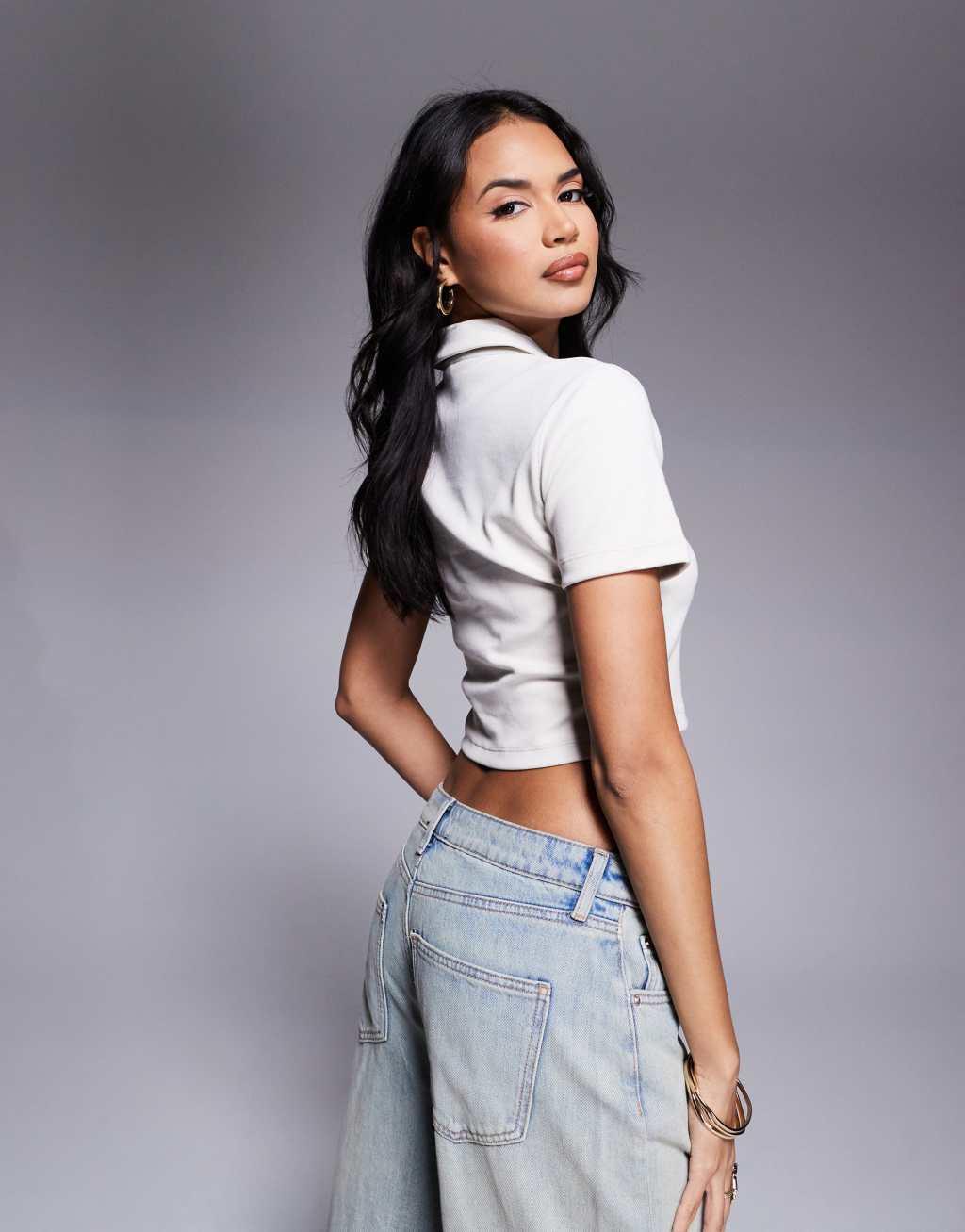 Nike essential cropped polo in beige Product Image