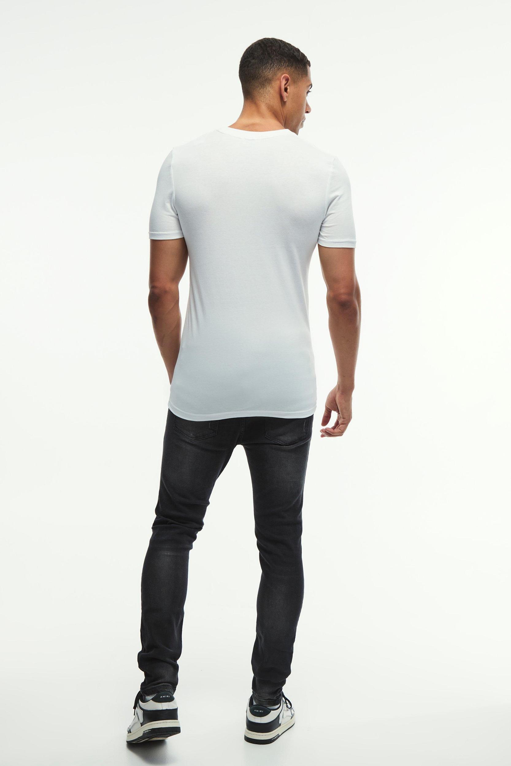 Skinny Stretch All Over Rip & Repair Paint Splatter Jeans | boohooMAN USA Product Image