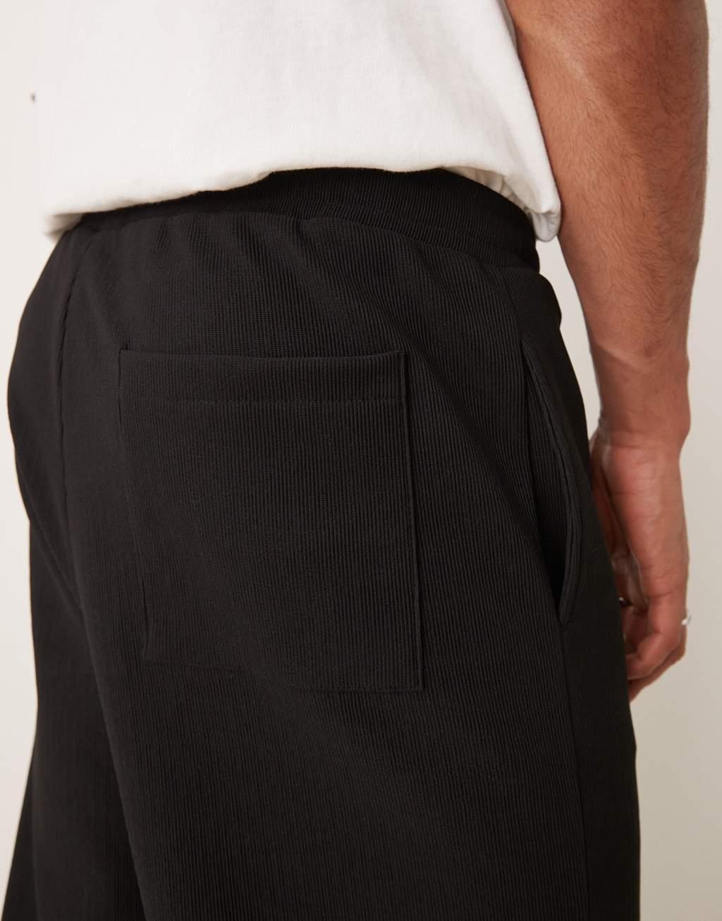ASOS DESIGN super baggy ribbed sweatpants in black - part of a set Product Image