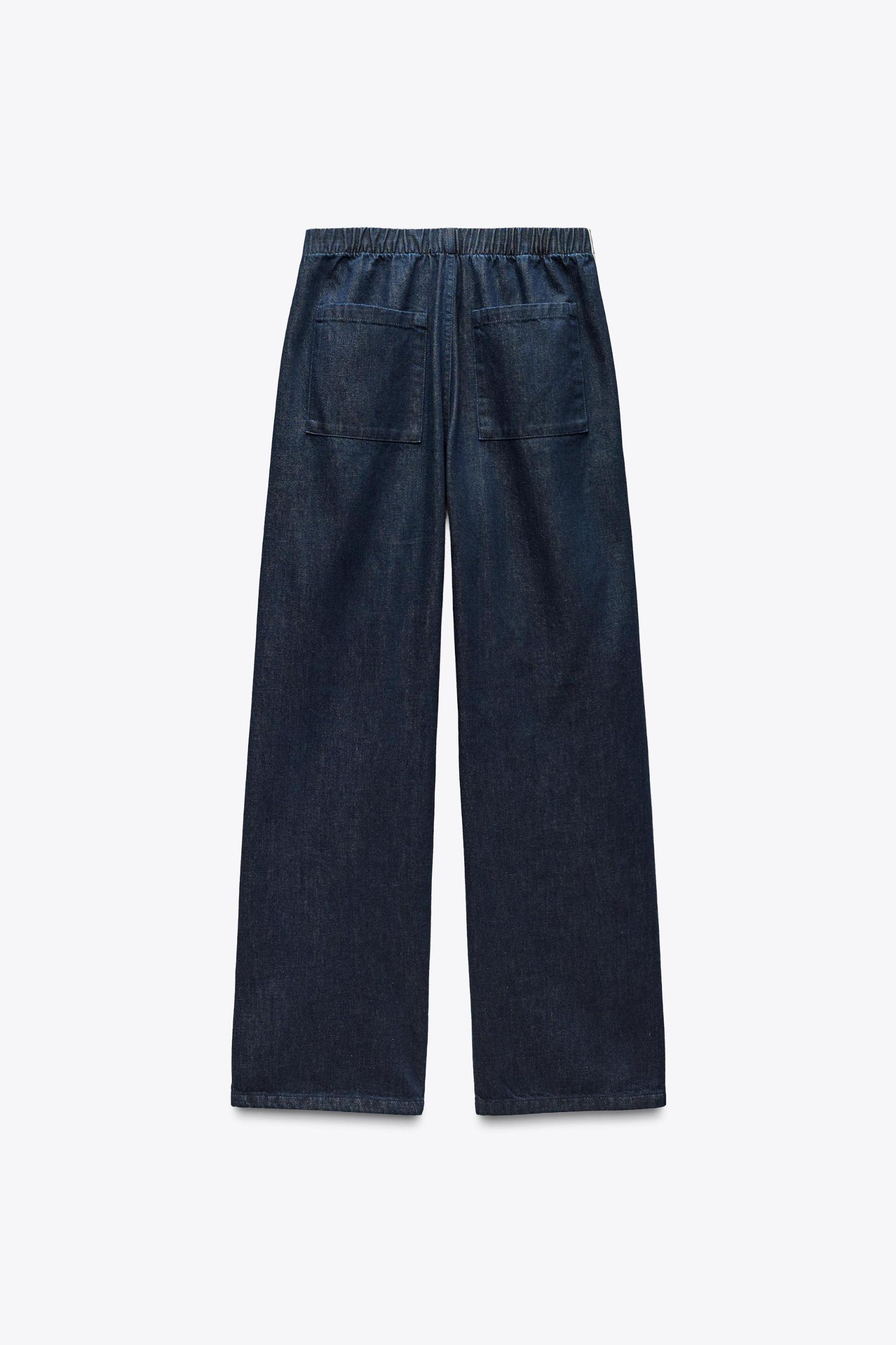 DENIM PANTS WITH SIDE BANDS Product Image