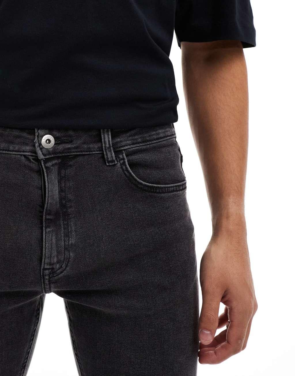 COLLUSION mid rise skinny jeans in washed black Product Image