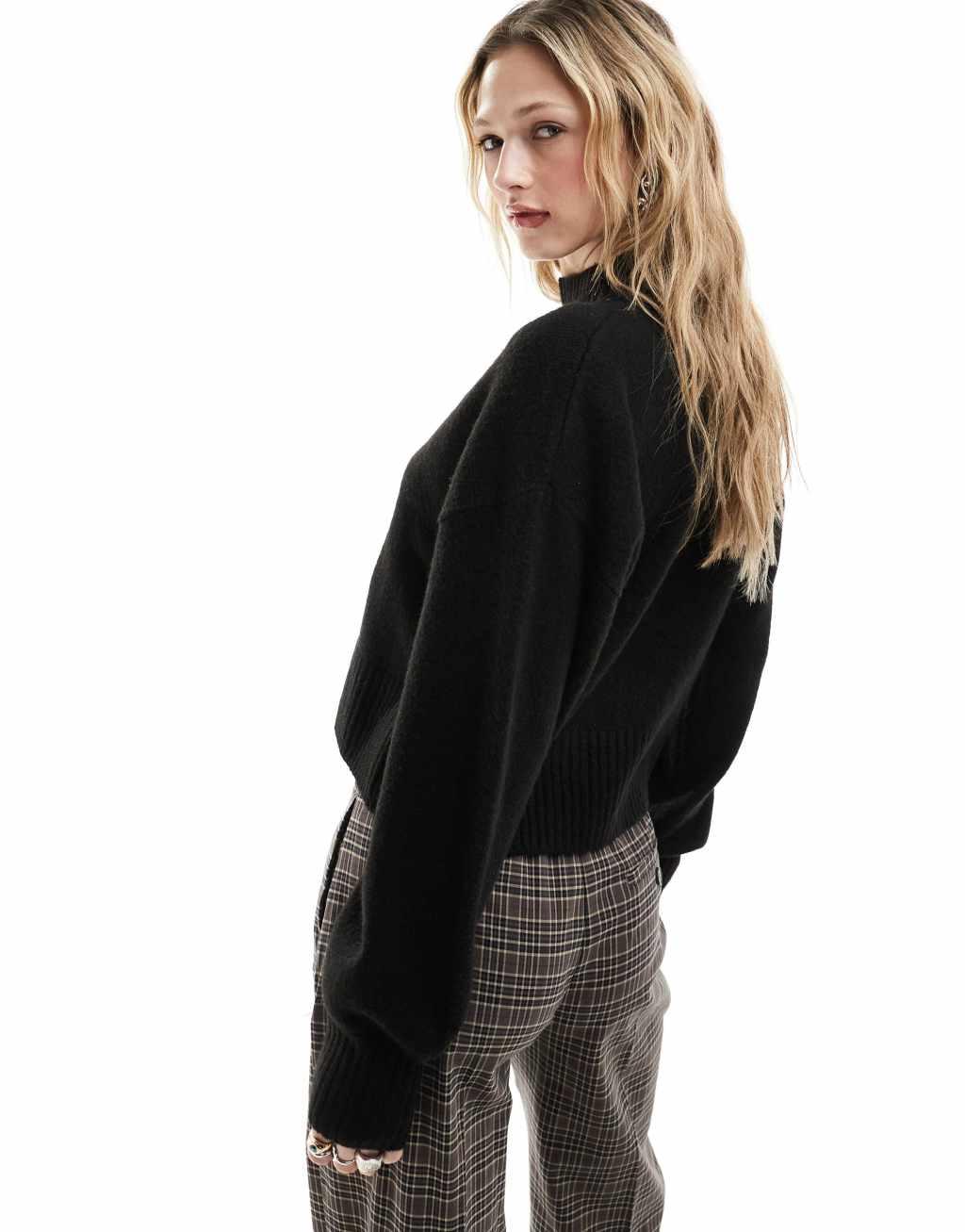 Monki knitted turtleneck sweater in black Product Image