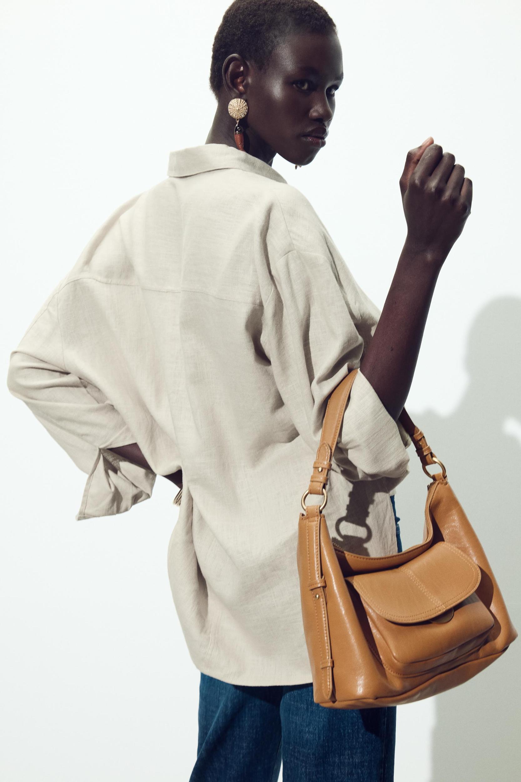 DOUBLE HANDLE POCKET BAG Product Image