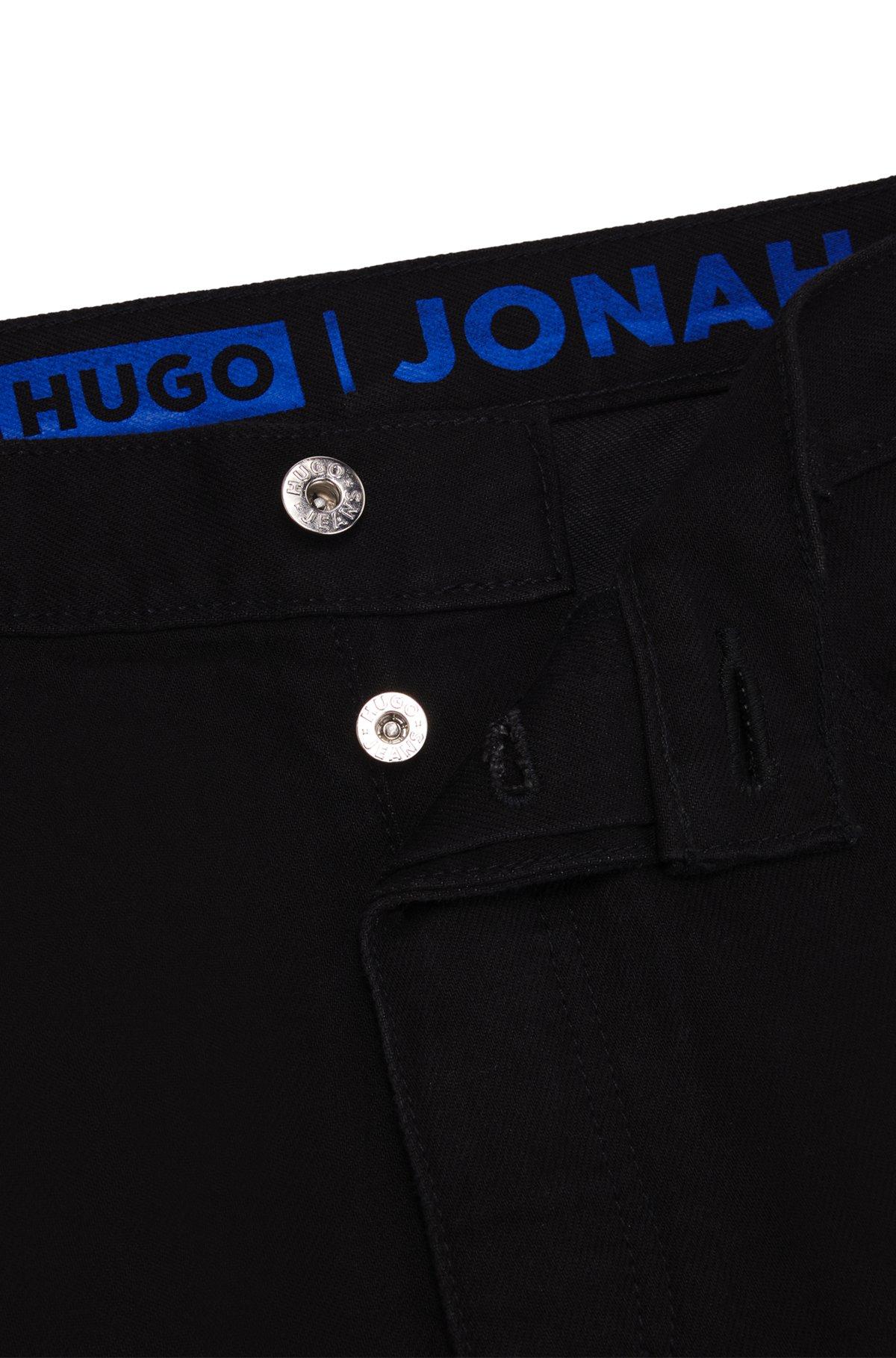 Regular-fit jeans in black rinse-washed denim Product Image