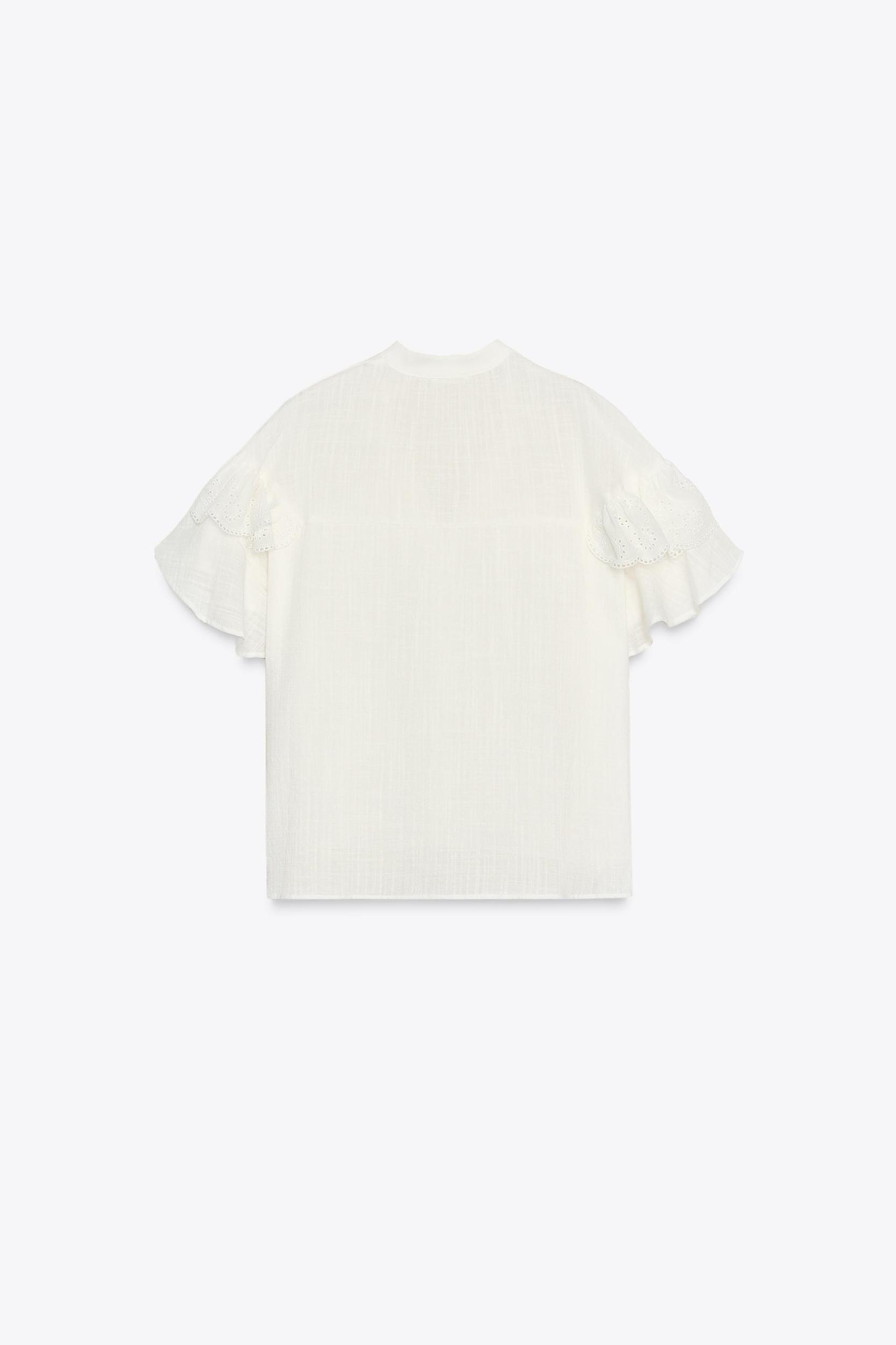 SHORT SLEEVE RUFFLE BLOUSE Product Image