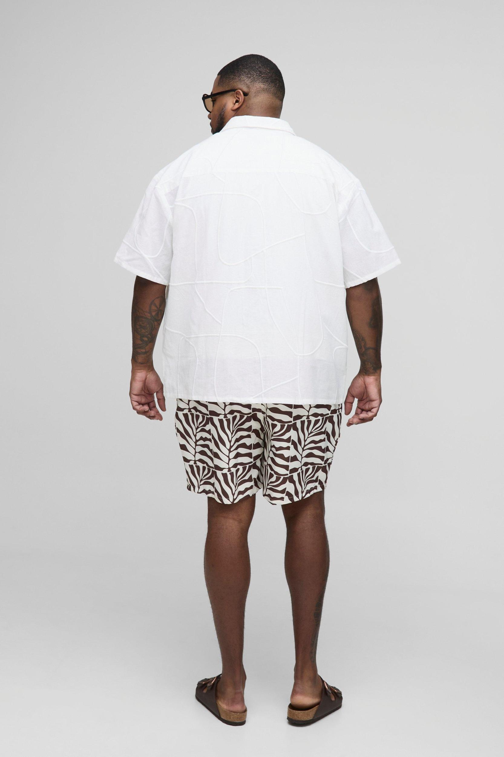 Plus Mid Length Palm Print Swim Trunks | boohooMAN USA Product Image