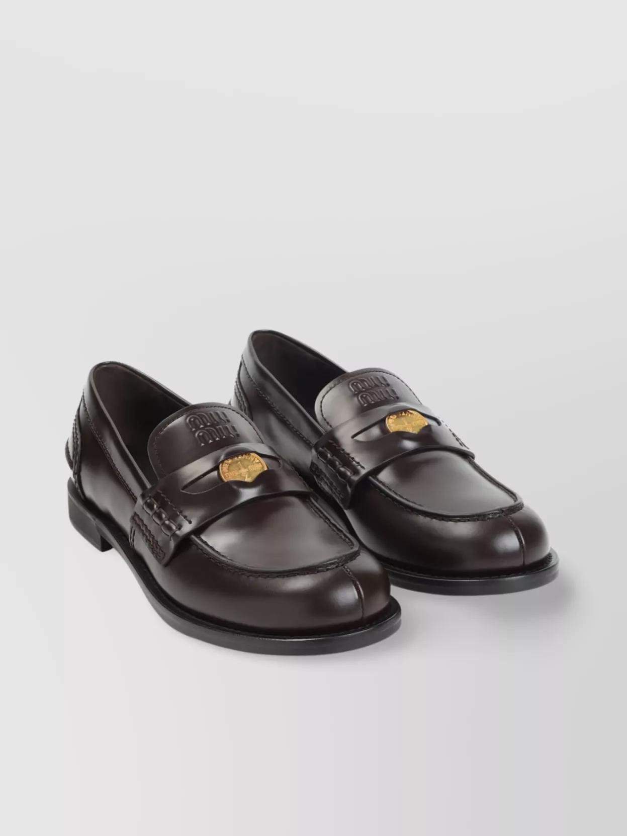 MIU MIU Leather Distressed Penny Loafers In Brown Product Image