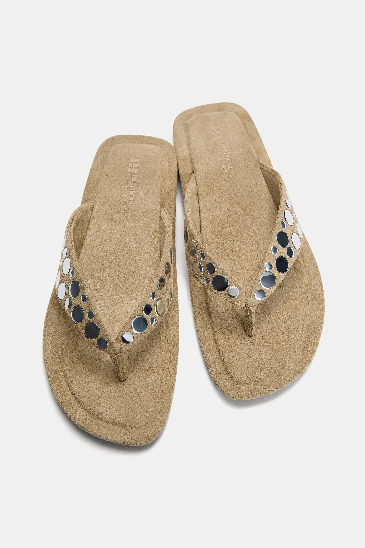 Flat sandals with decorations Product Image