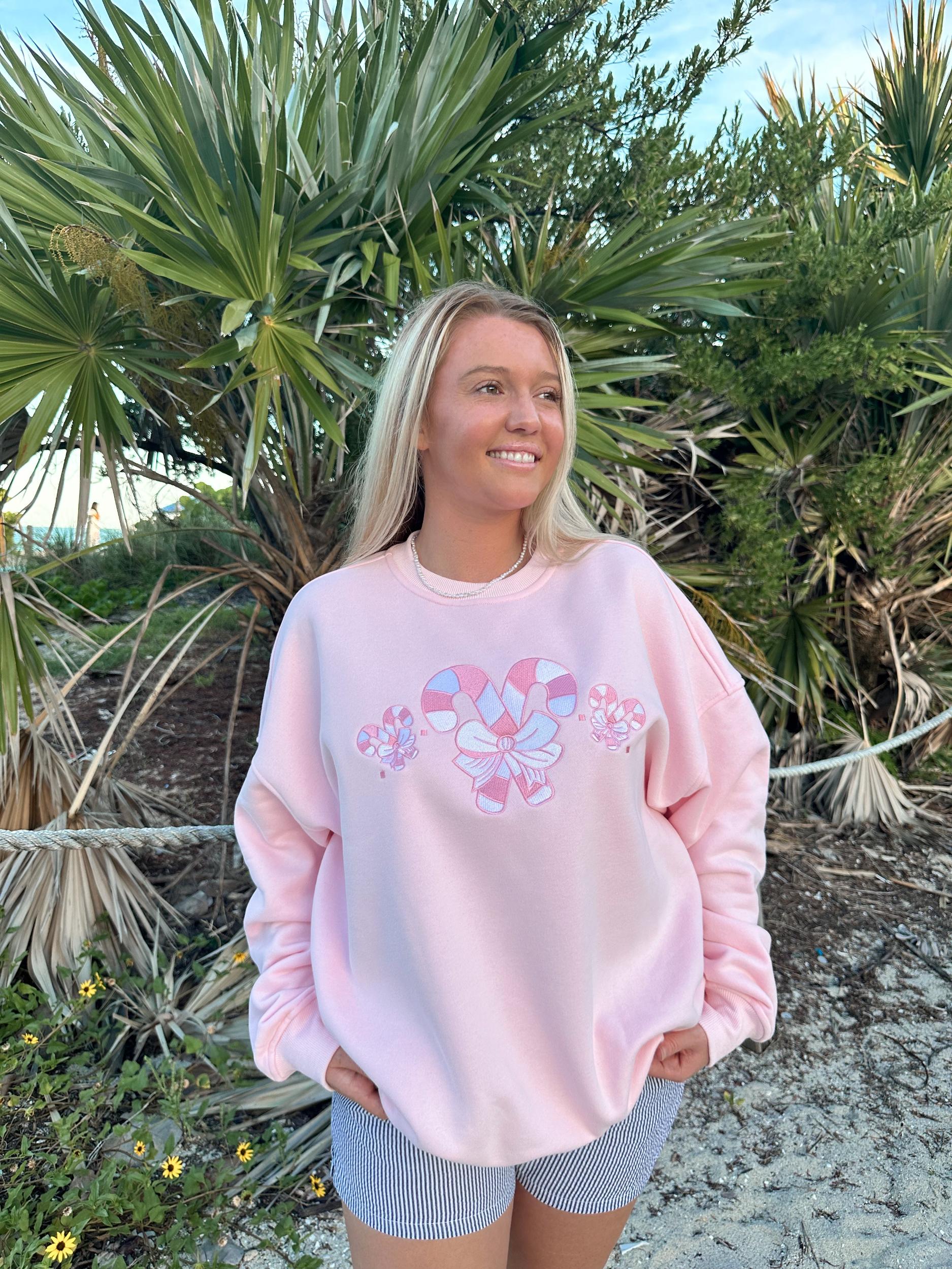 Light Pink Candy Cane Wonderland Sweatshirt Product Image