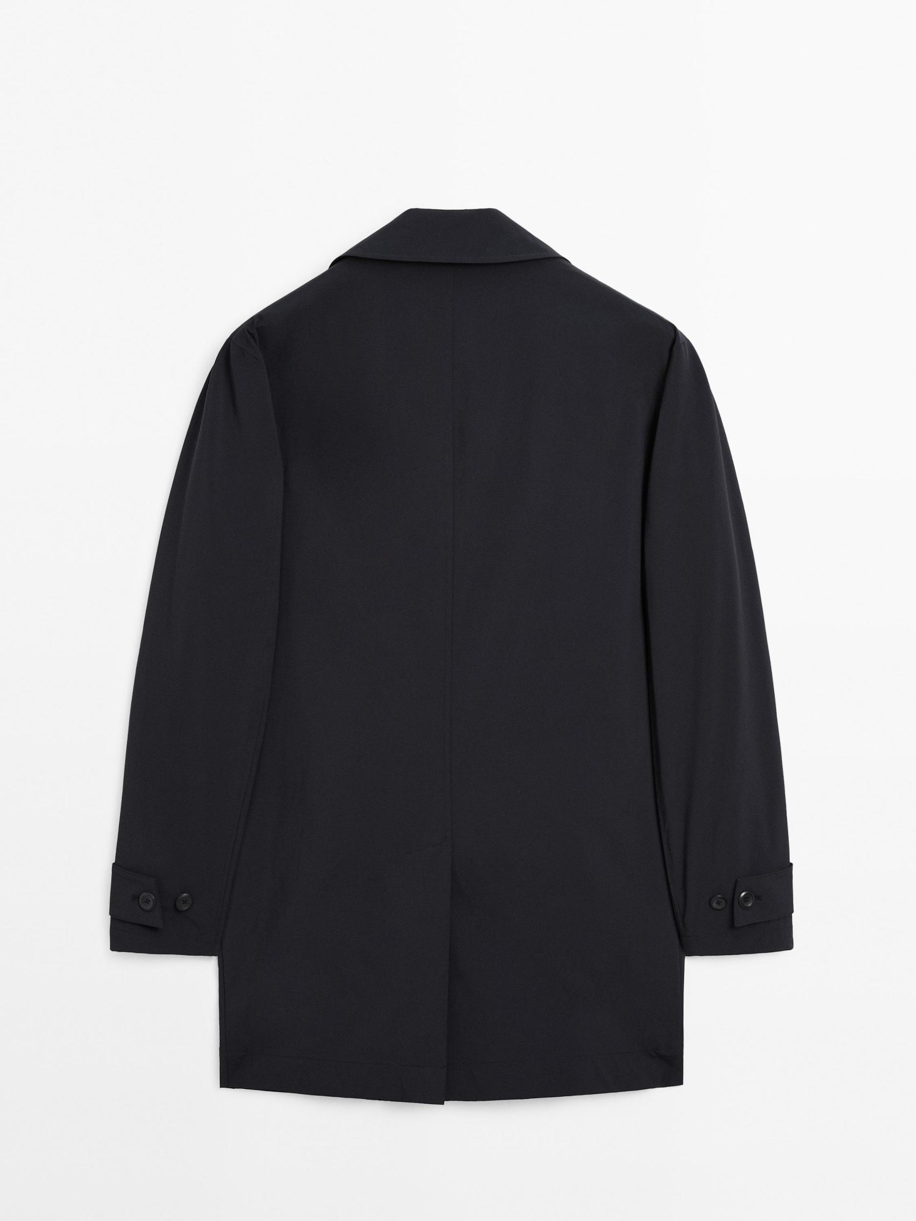 Lightweight trench coat with hidden buttons Product Image