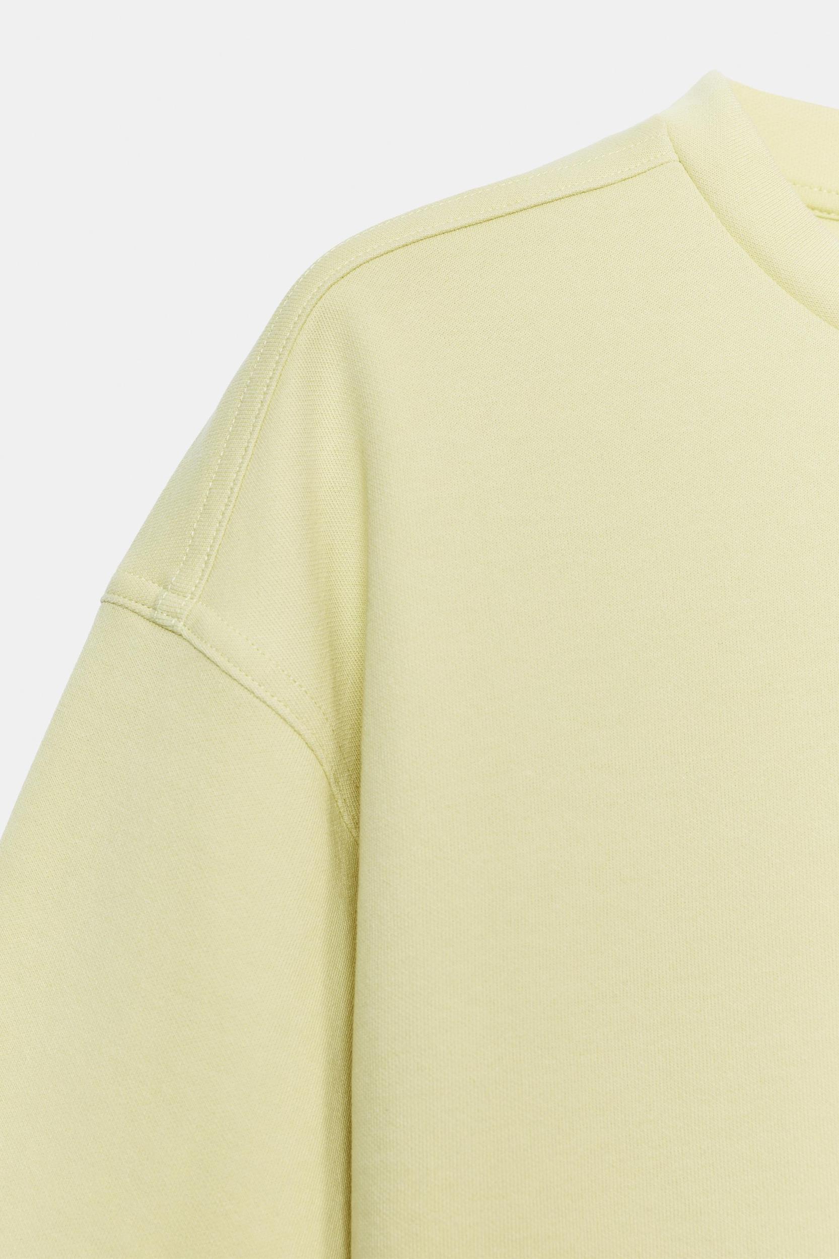 INTERLOCK SLIT T-SHIRT Product Image