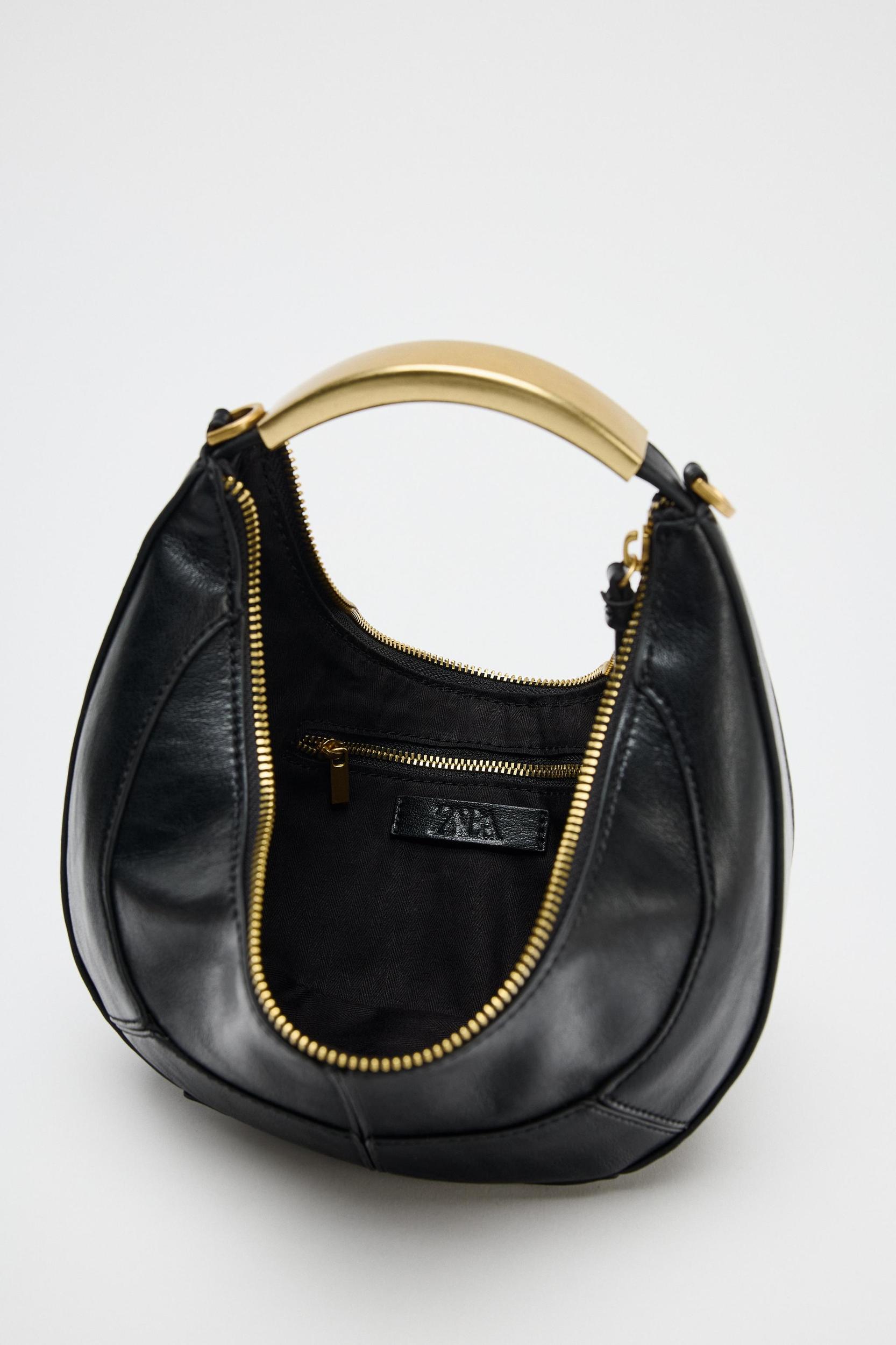 OVAL BAG WITH METAL HANDLE Product Image
