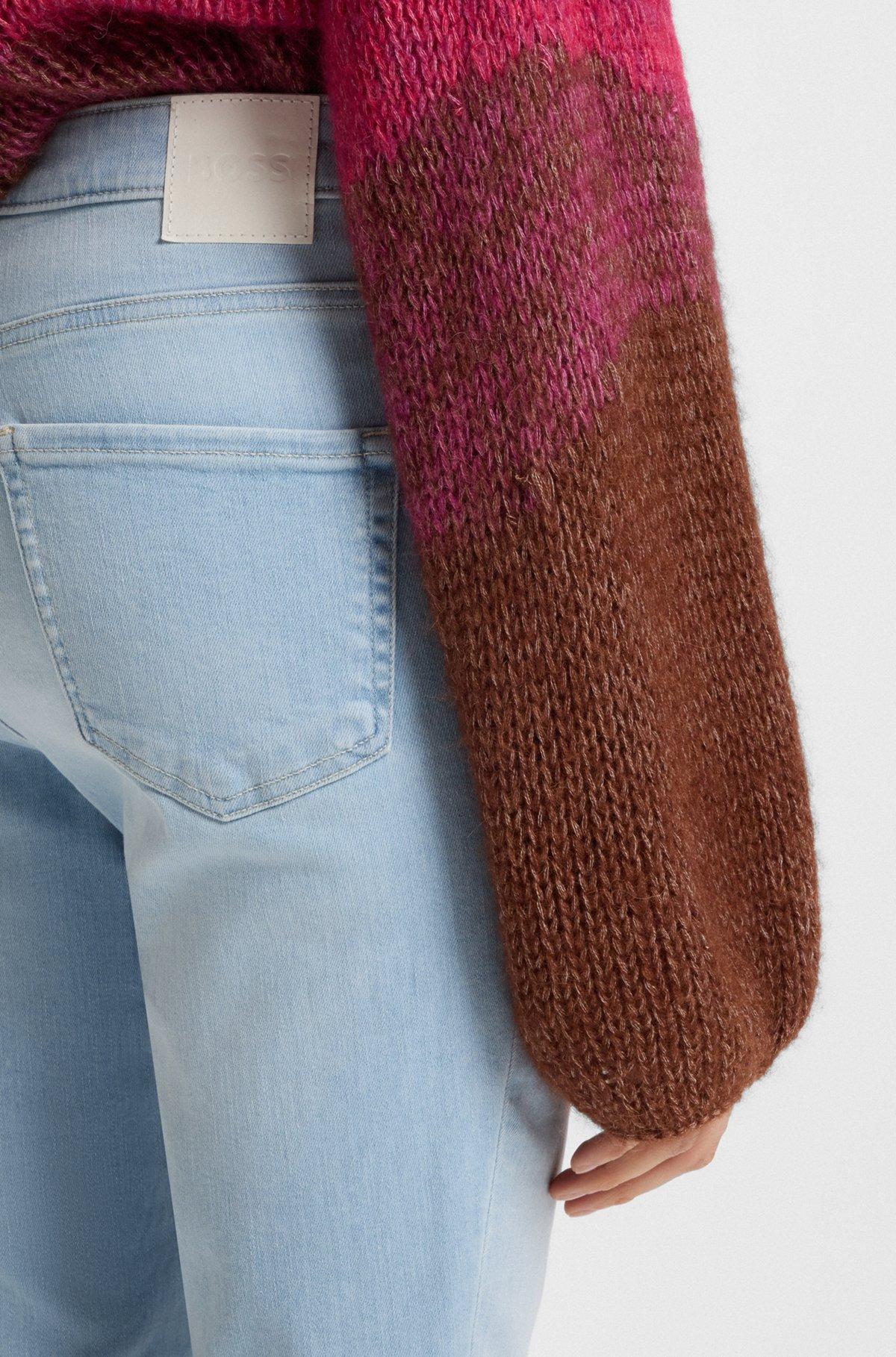 Bootcut jeans in blue stretch denim with slit hems Product Image