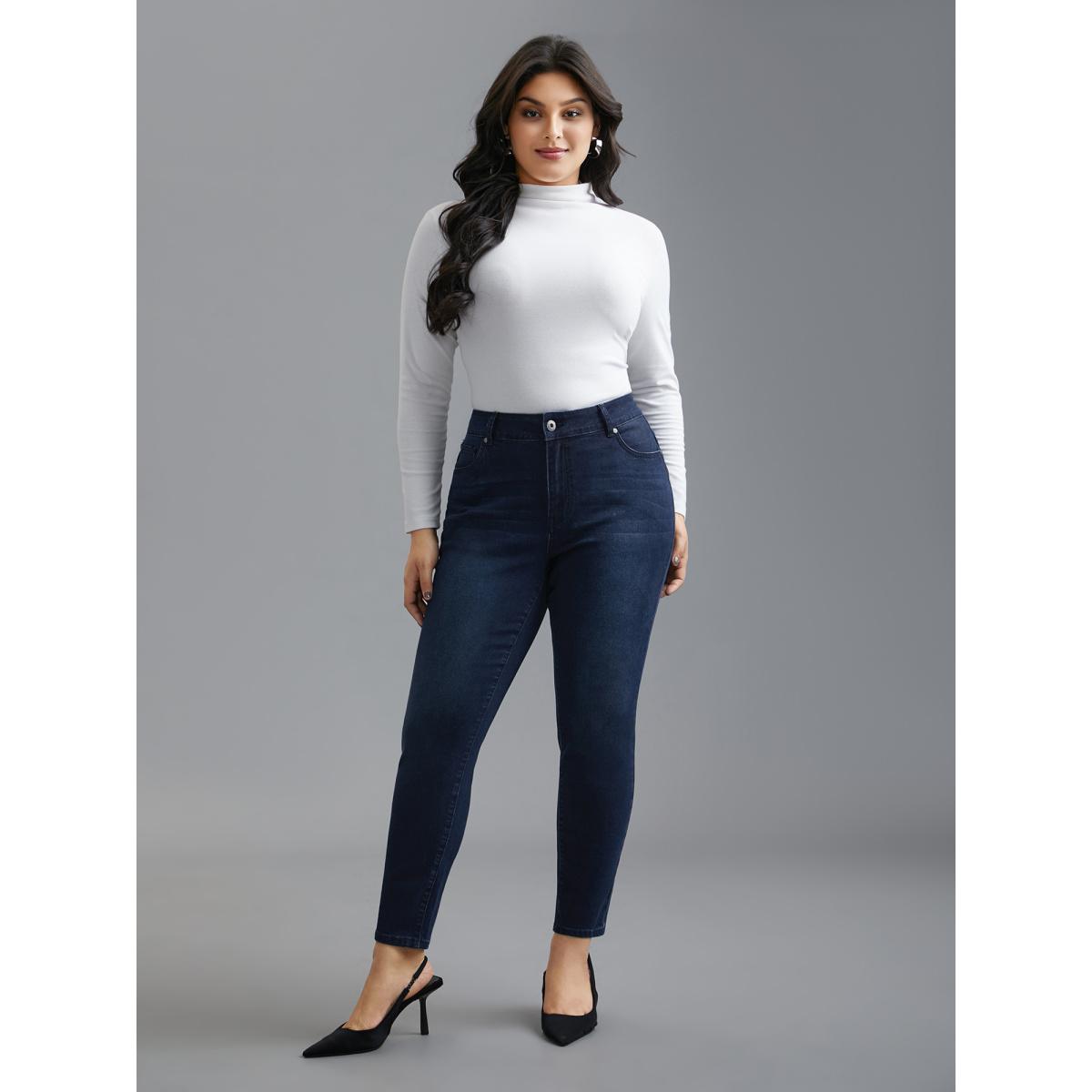 Plus Size Booty-Lifting Skinny Fit Mid-Rise Jeans Women Denimindigo Elegant Button Medium stretch Slanted pocket Jeans BloomChic 22/3X Product Image