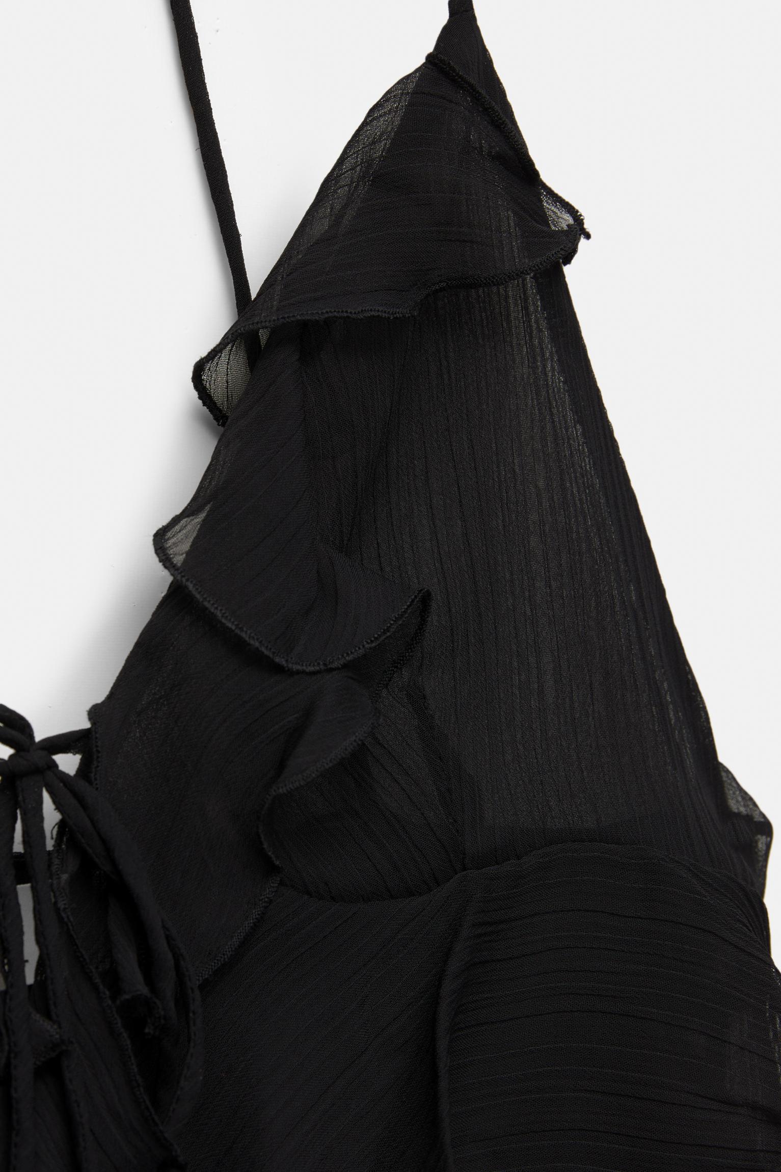 Ruffled top with bow Product Image