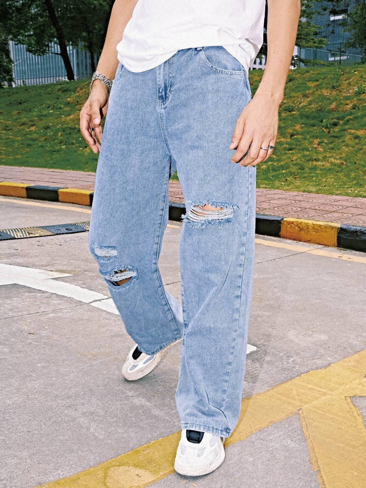 Men's Light Washed Ripped Jeans Product Image