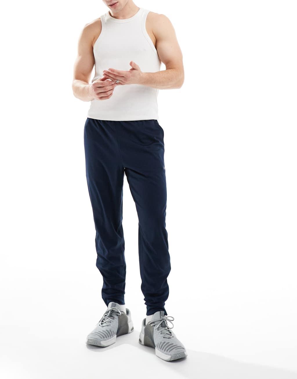 Nike Training Totality knit tapered sweatpants in navy Product Image