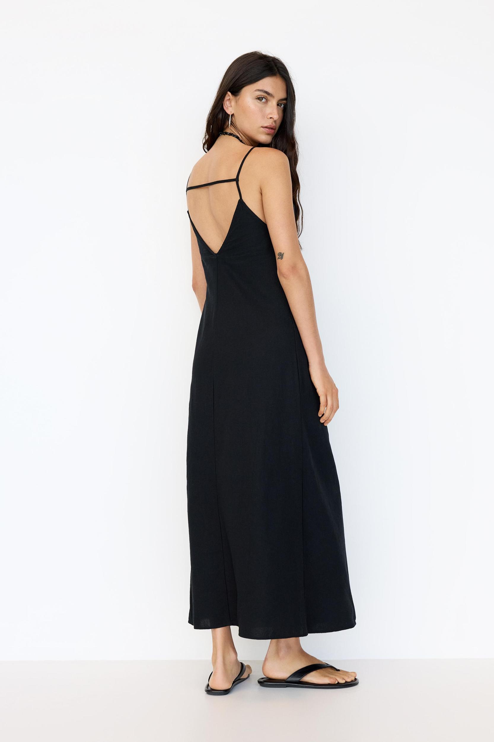 Rustic midi dress with straps Product Image