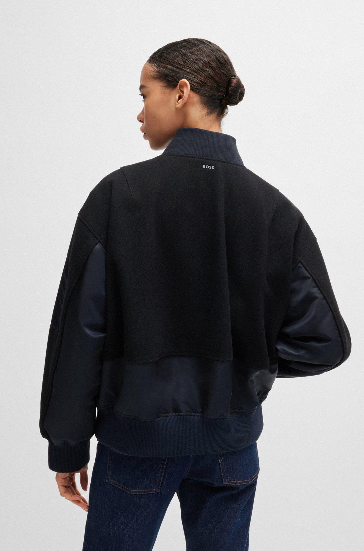 Water-repellent bomber jacket with zipped sleeve pocket Product Image
