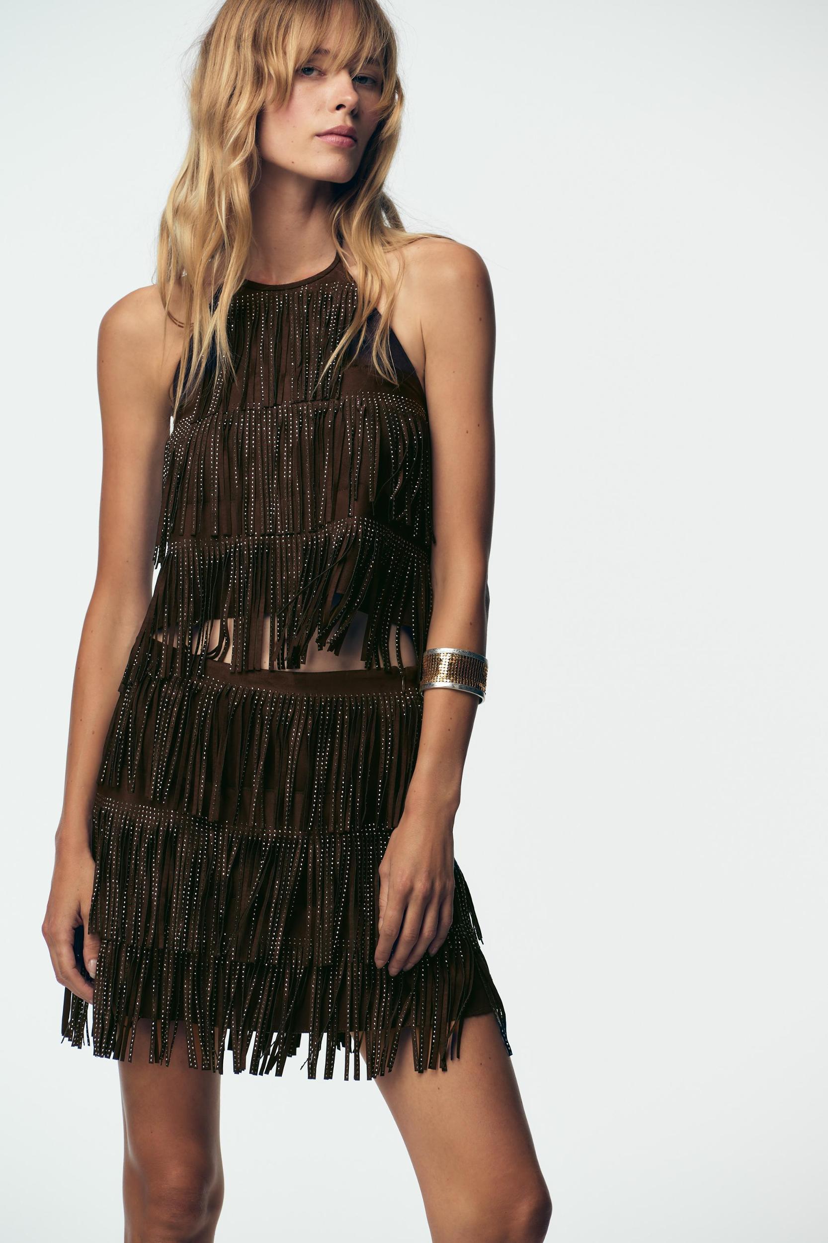 SHIMMER FAUX SUEDE FRINGE TOP Product Image