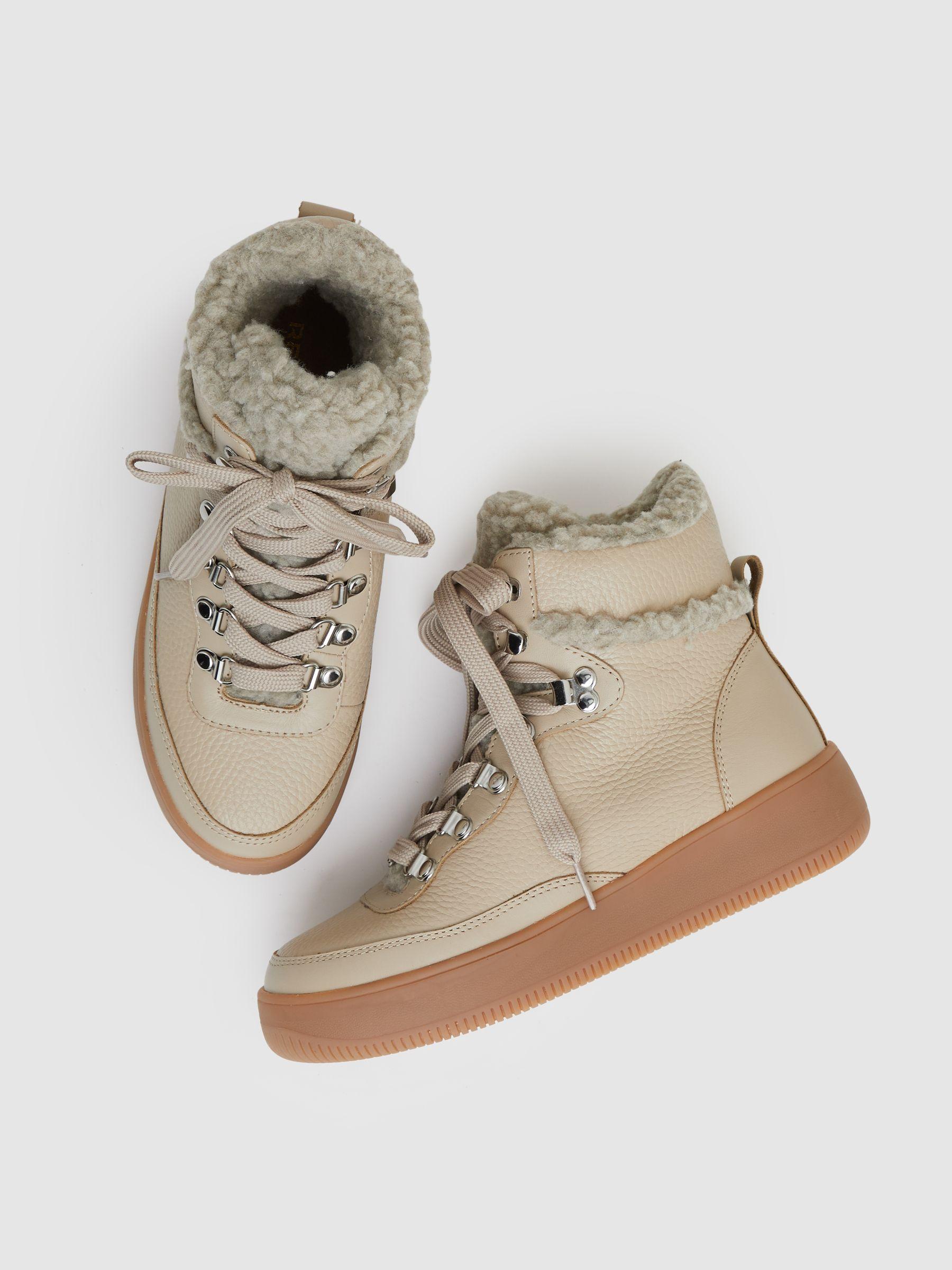 Grained Leather and Fleece Ankle Boots in Cream Product Image