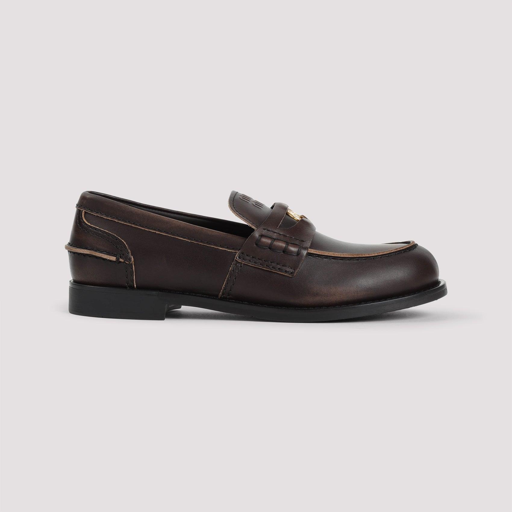 MIU MIU Leather Distressed Penny Loafers In Brown Product Image