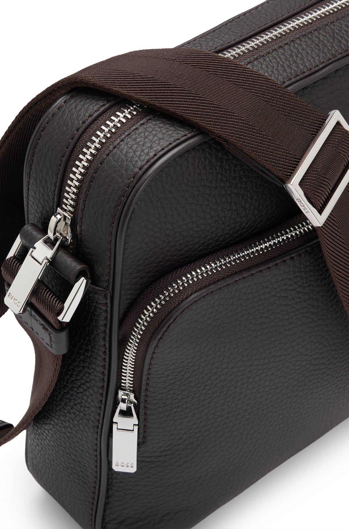 Reporter bag in grained Italian leather with embossed logo Product Image