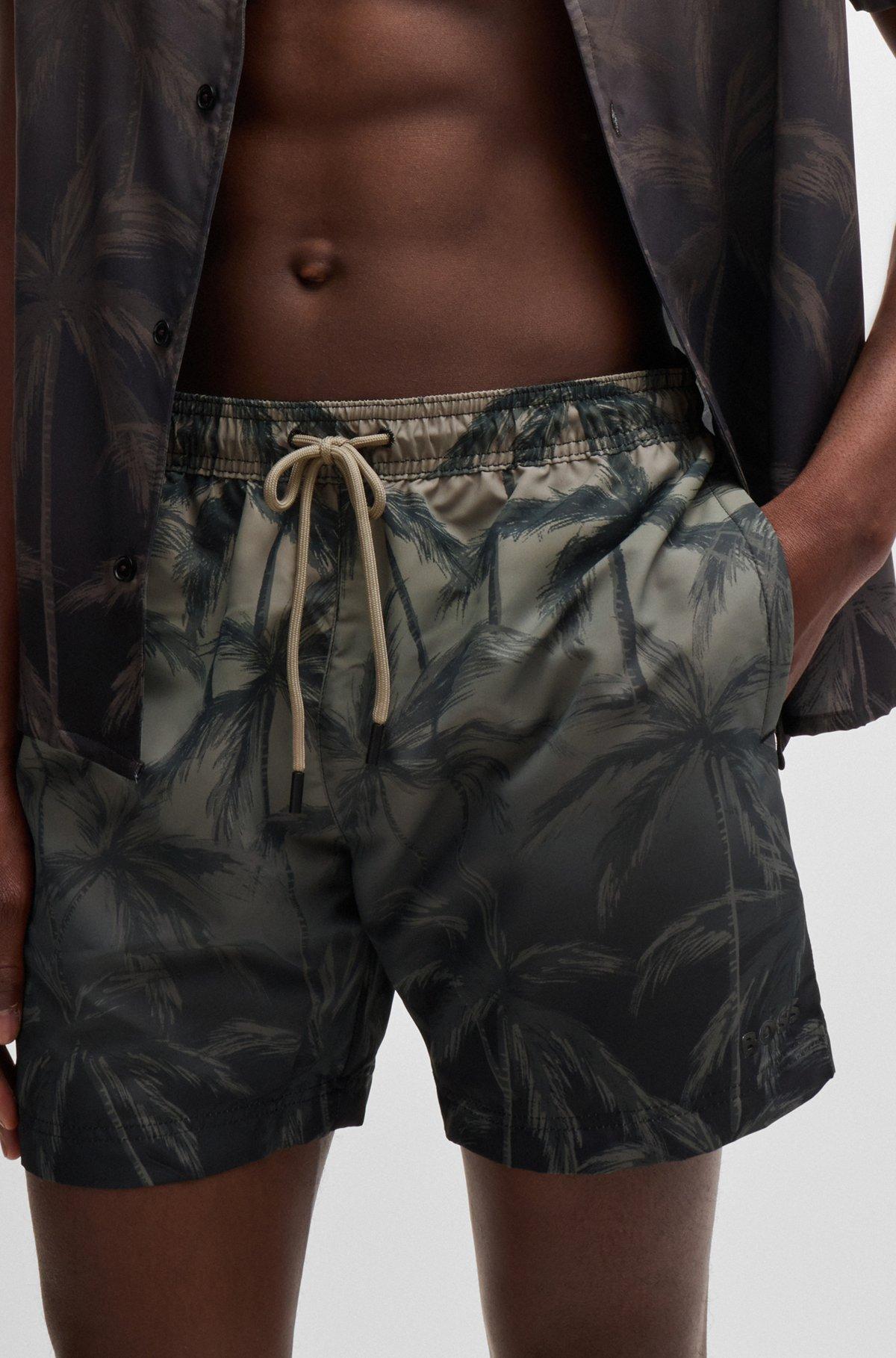 Quick-dry swim shorts with seasonal print Product Image