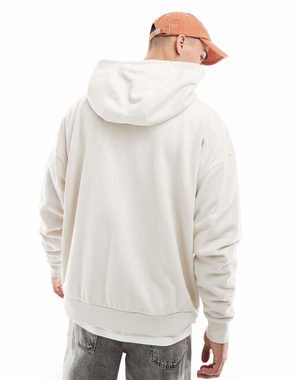 Nike Club oversized hoodie in beige Product Image