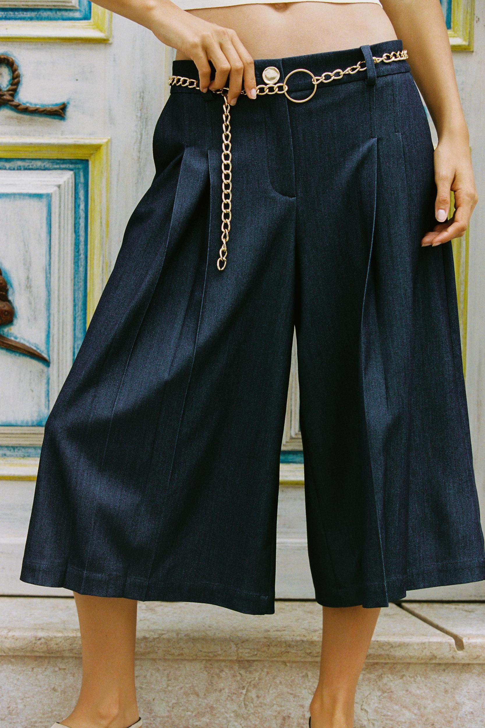 BELTED CHAIN LONG SHORTS Product Image