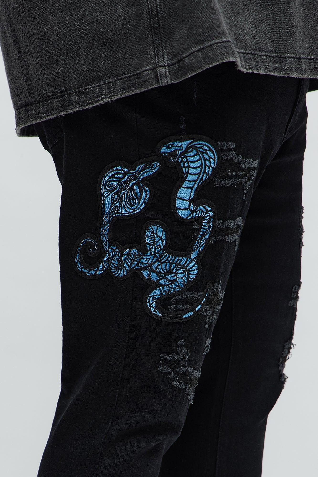 Side Snake Rip And Repair Stacked Skinny Jeans - Black Product Image