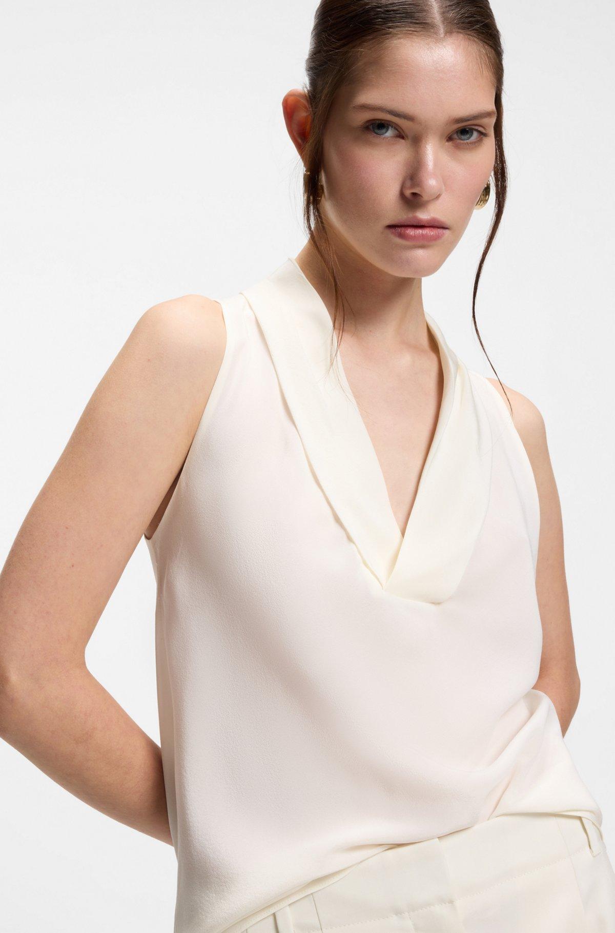 Sleeveless blouse in sandwashed silk with V neckline Product Image