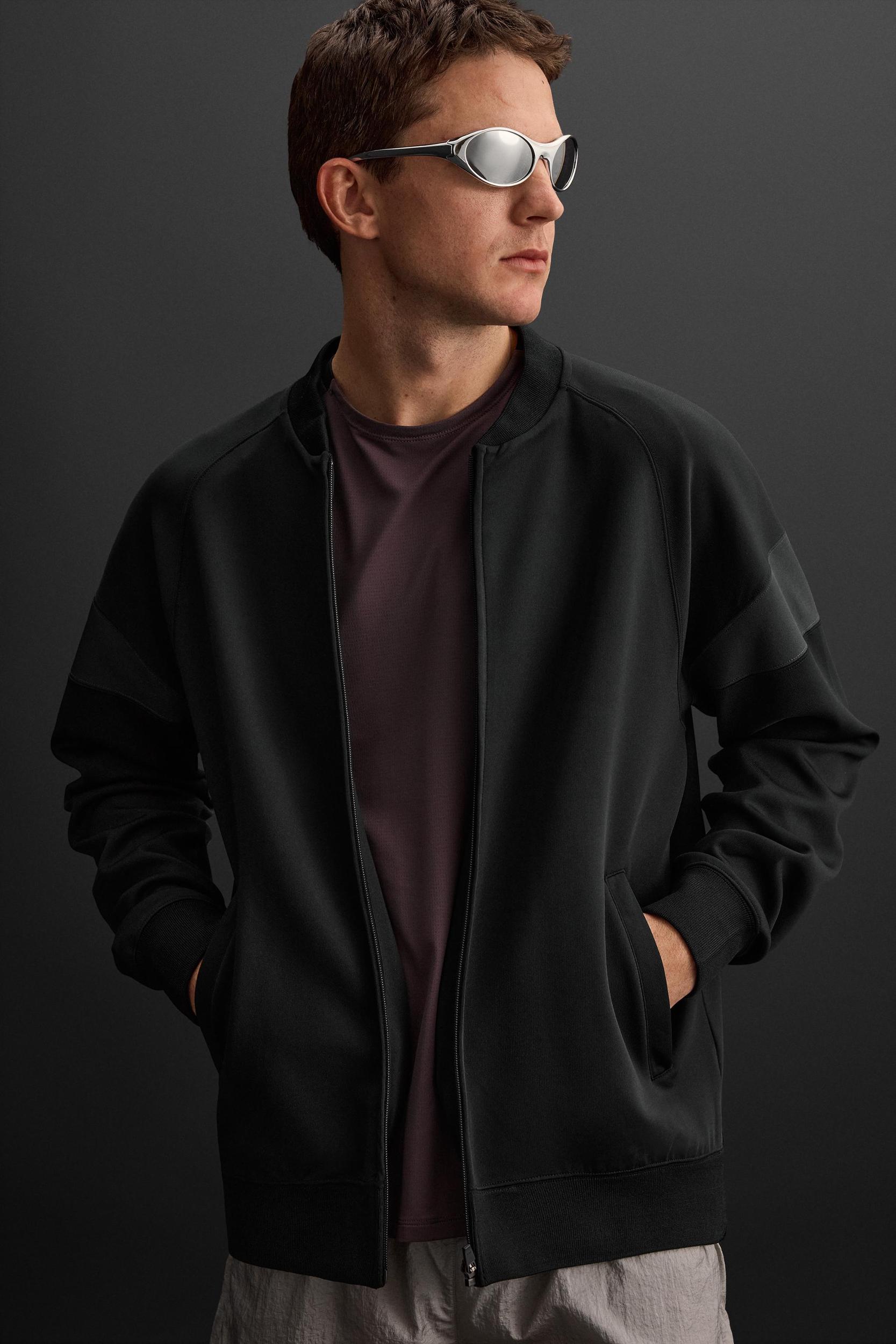 TECHNICAL SWEATSHIRT WITH ZIPPER Product Image